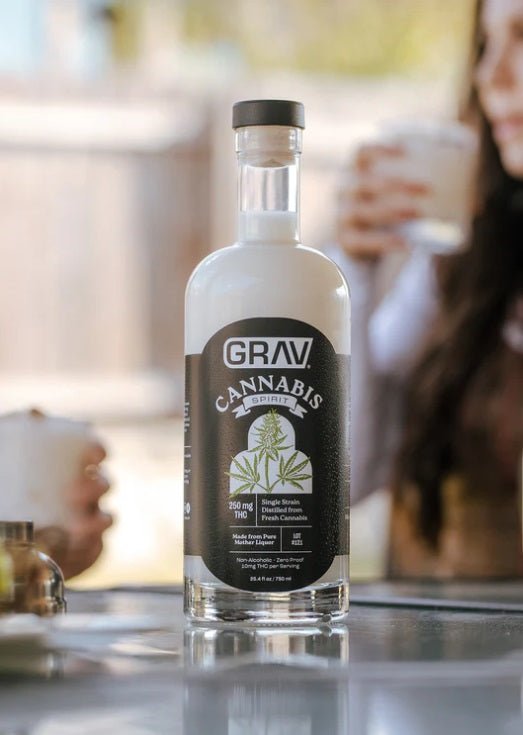 Bottle of GRAV Cannabis Spirit hemp THC drink with clear label and dark glass bottle, showcasing the product's branding and packaging details.