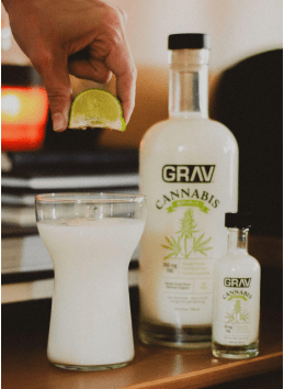 Bottle of GRAV Cannabis Spirit hemp drink with THC, featuring a dark label and cannabis leaf design.
