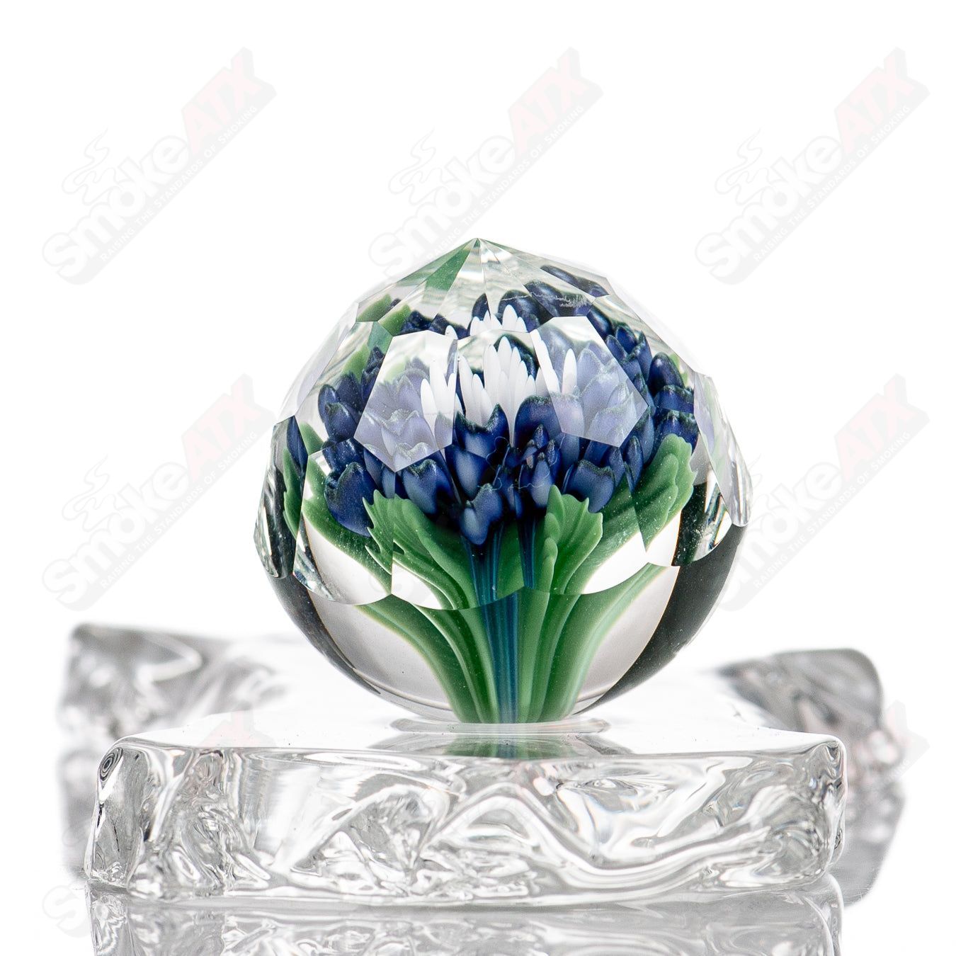 Colorful Flower Marble #1 by Fatal Facets, a glass impact marble with intricate floral design and vibrant patterns.