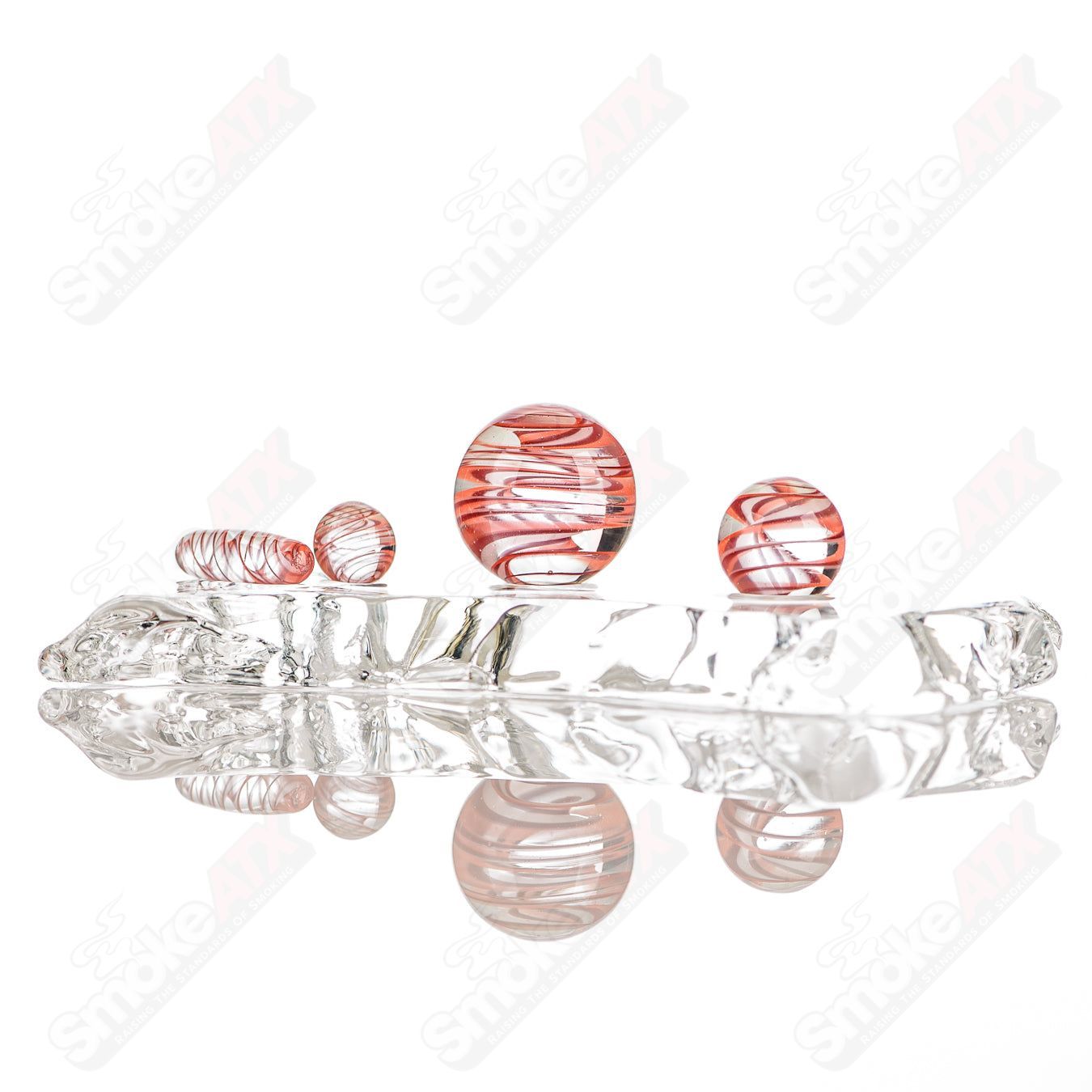 Glass Cherry and Orange Lattice Slurper Set by Smoke ATX, featuring colorful, textured glass designs for enjoying beverages.