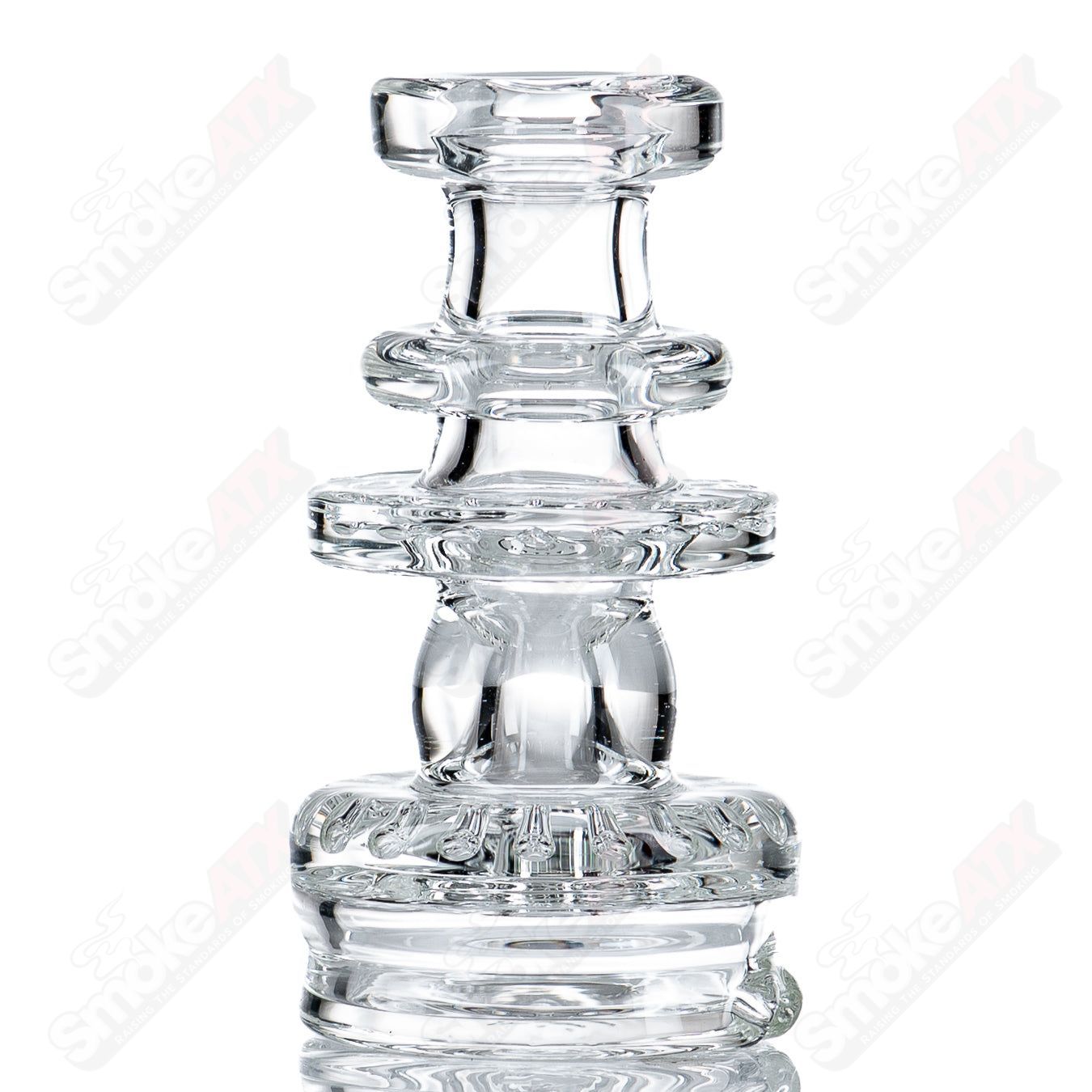 Clear Dry Puffco Top by Austin Made Glass Co, a transparent glass attachment for Puffco devices with detailed craftsmanship.