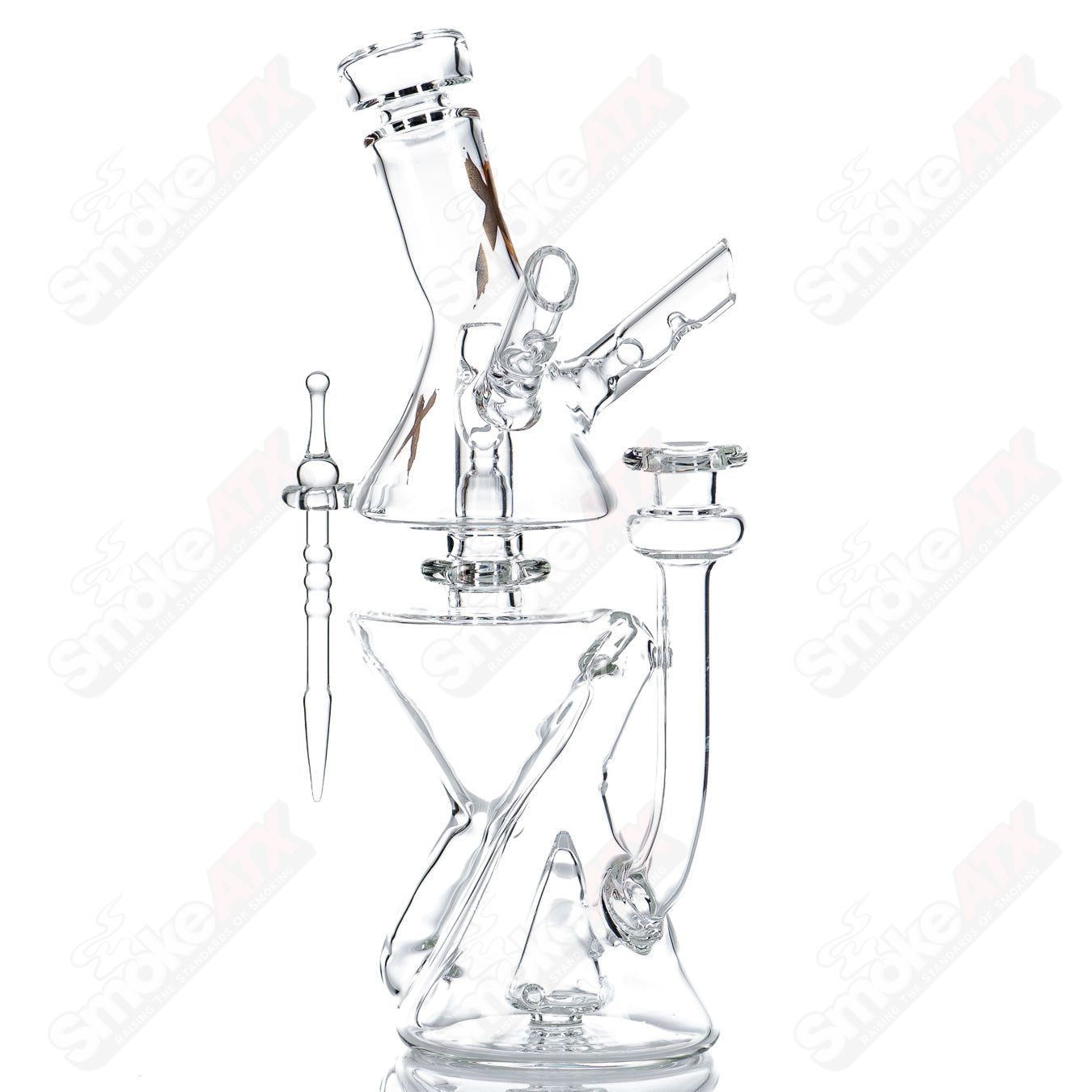 Clear Xhalecycler RAM Robert Mickelsen glass recycler with intricate heady glass design and transparent construction.