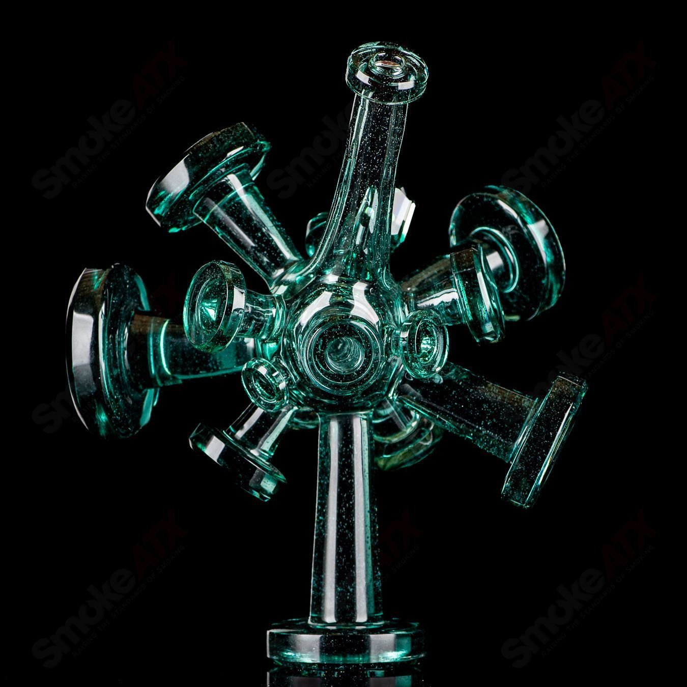 Color Spore Rig by JMass, a vibrant heady glass concentrate rig with colorful, intricate spore-like patterns.
