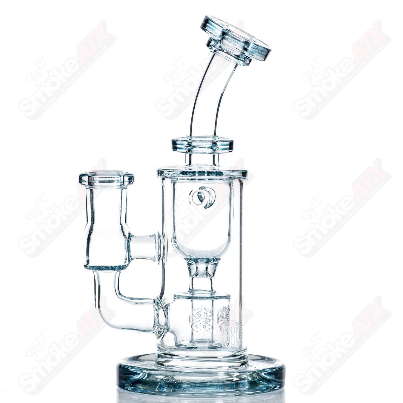 Color Taurus Mini Fat Boy Glass concentrate rig with vibrant colors and compact design, made by Fat Boy Glass.