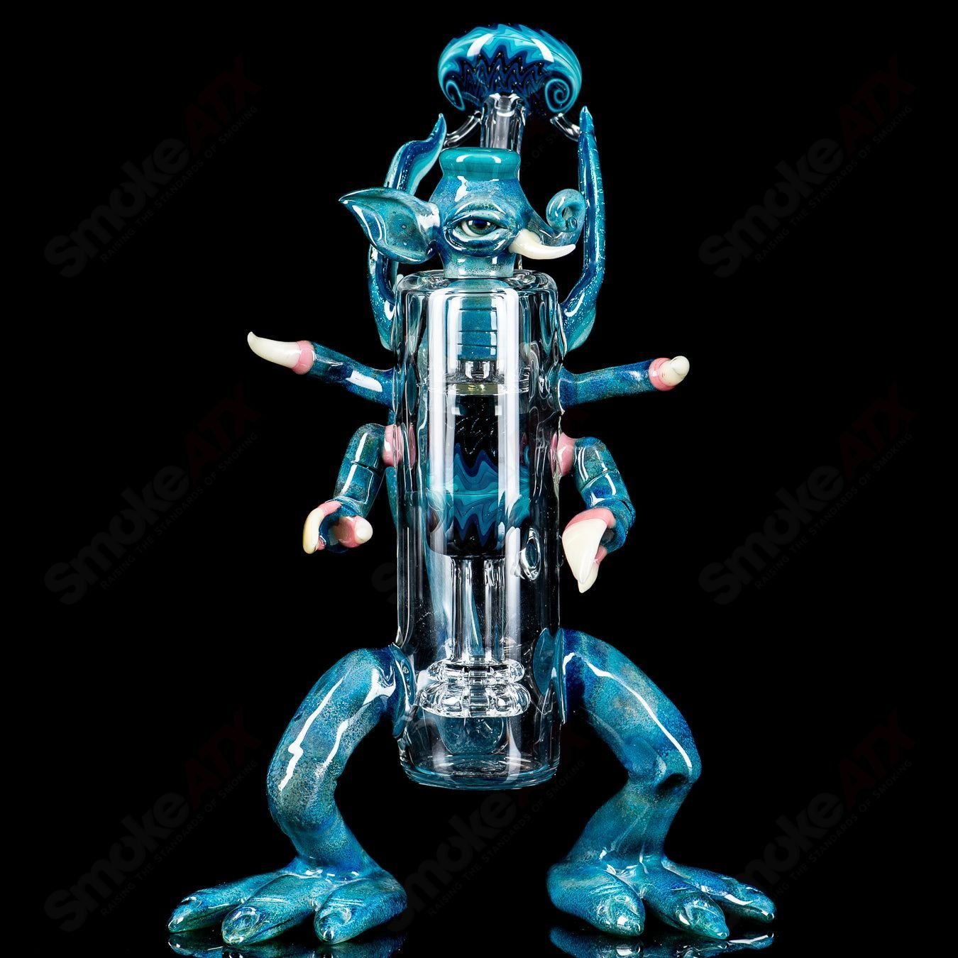 Creature Rig by E. Ross X SALT, a colorful heady glass concentrate rig with intricate creature details and vibrant glasswork.