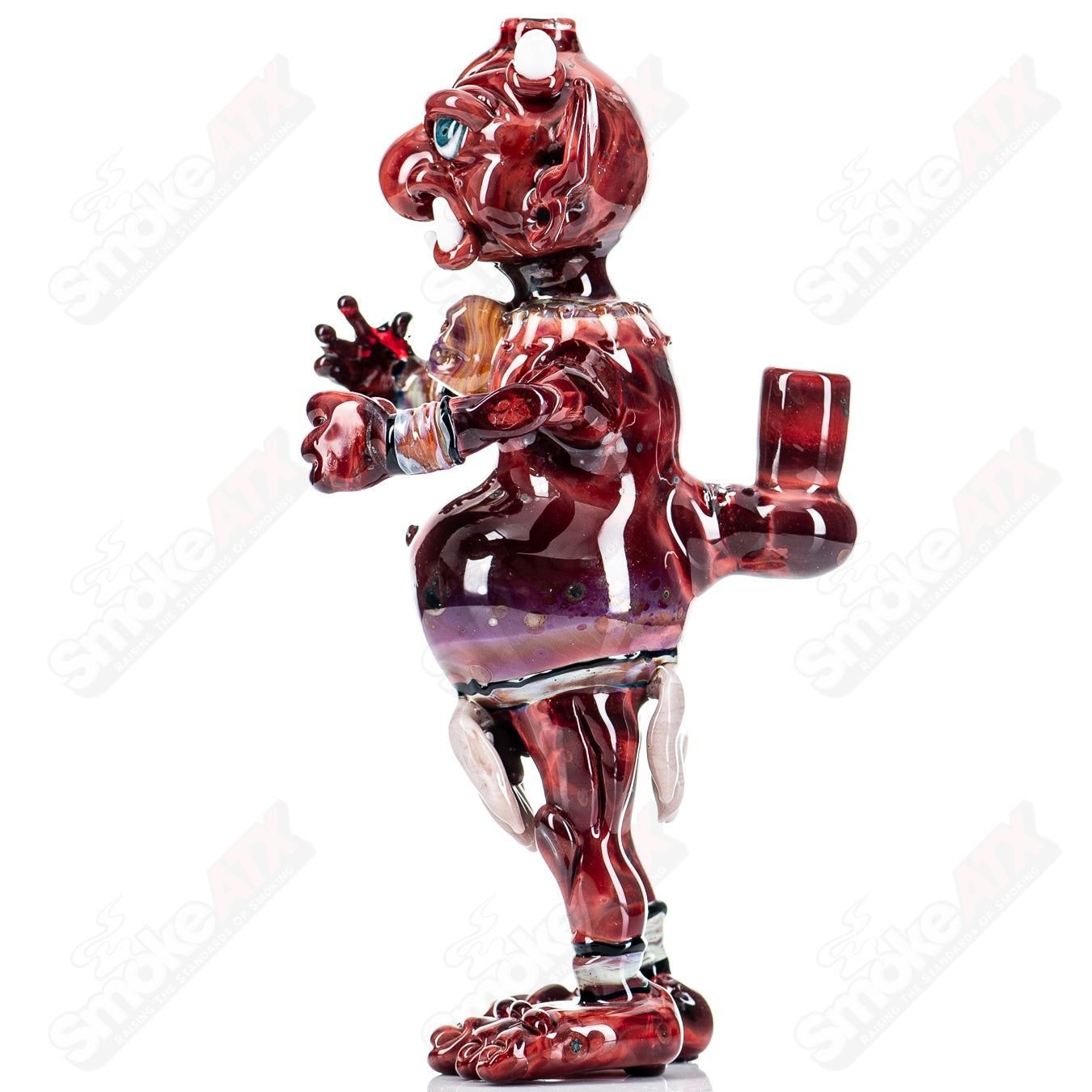 Hendy Devil Rig Heady Glass concentrate rig with intricate red and black devil design and clear glass accents.