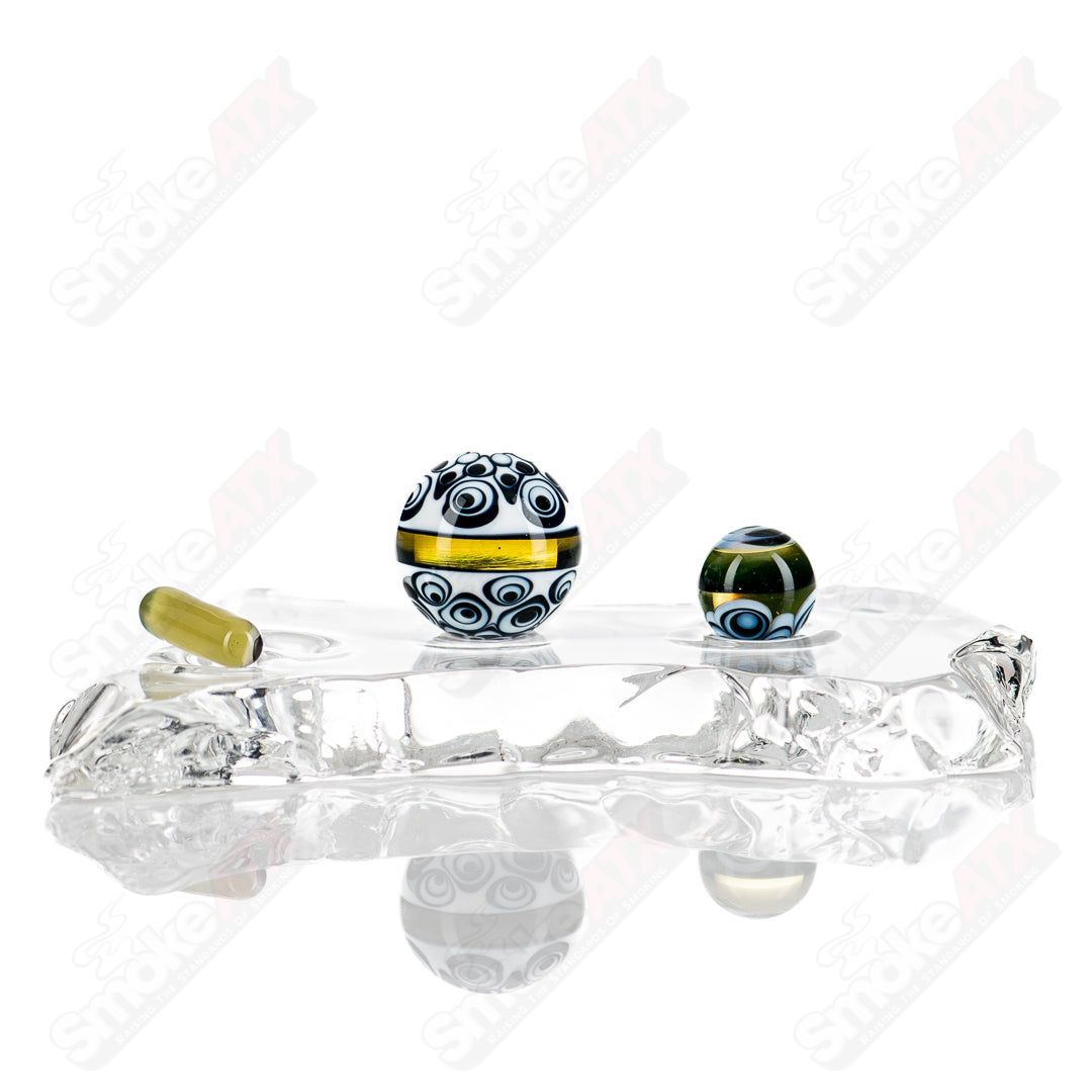 Indo Glass UV Dotstack Slurper Set featuring colorful glass slurpers with UV-reactive dots, ideal for enjoying concentrates.