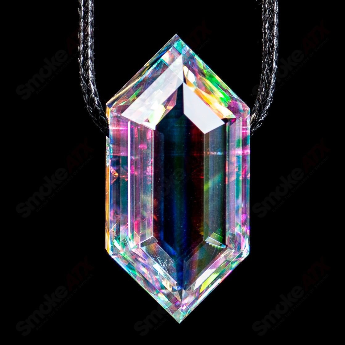 Dichro Diamond Faceted Pendant by Fatal Facets, a colorful glass pendant with sparkling facets on a silver chain.