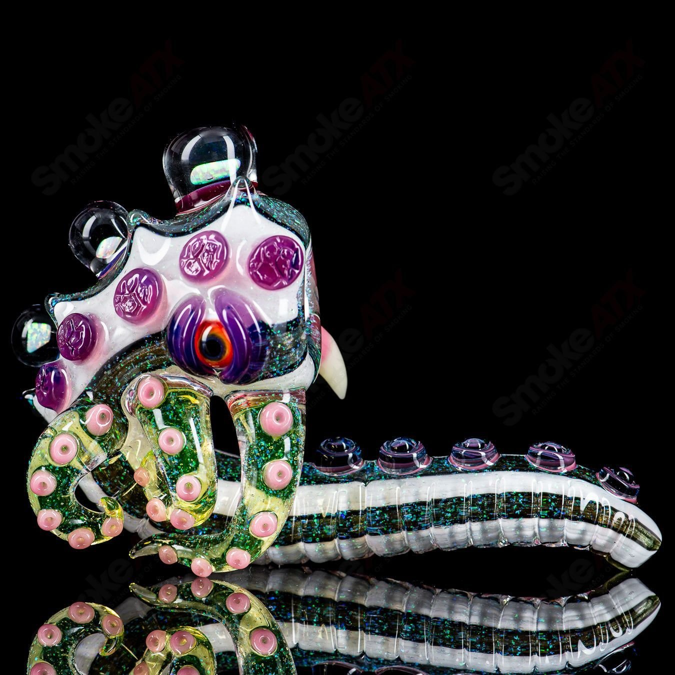 Dichro Monster Sherlock heady glass pipe signed by Harold Ludeman from Salt Glass, featuring vibrant dichroic colors and intricate design.