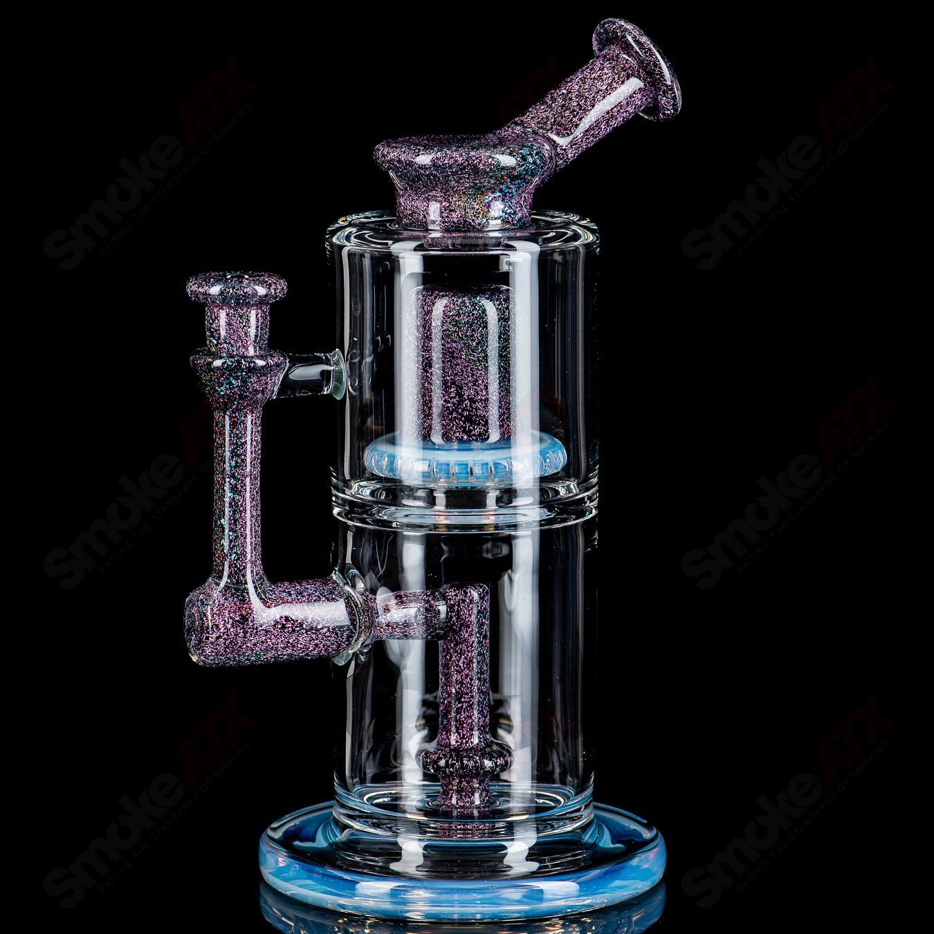 Colorful Dichro Rig by Mad Rob, glass concentrate rig with vibrant iridescent finish, showcasing intricate design and craftsmanship.