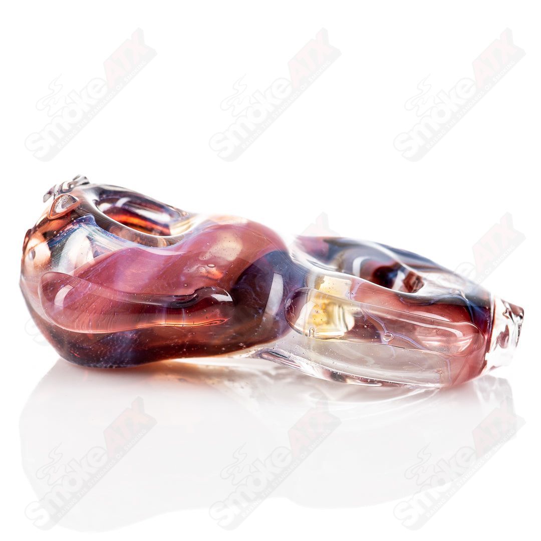Nobody Glass donut-shaped glass hand pipe with colorful design, showcasing intricate glasswork and smooth surface.