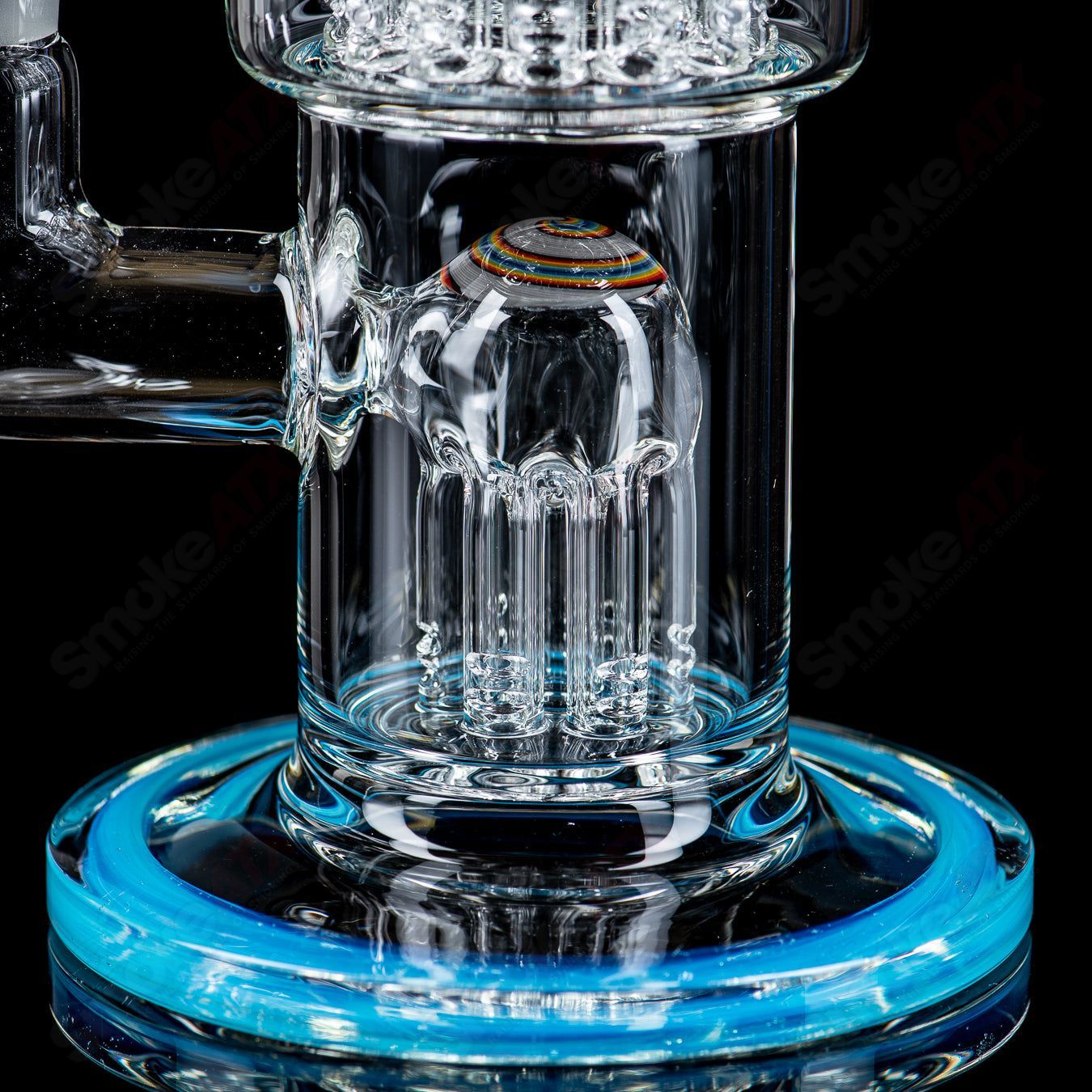 Toro Glass double Micro 7/13 arm perc bubbler with worked sections, showcasing intricate glasswork and detailed percolator design.