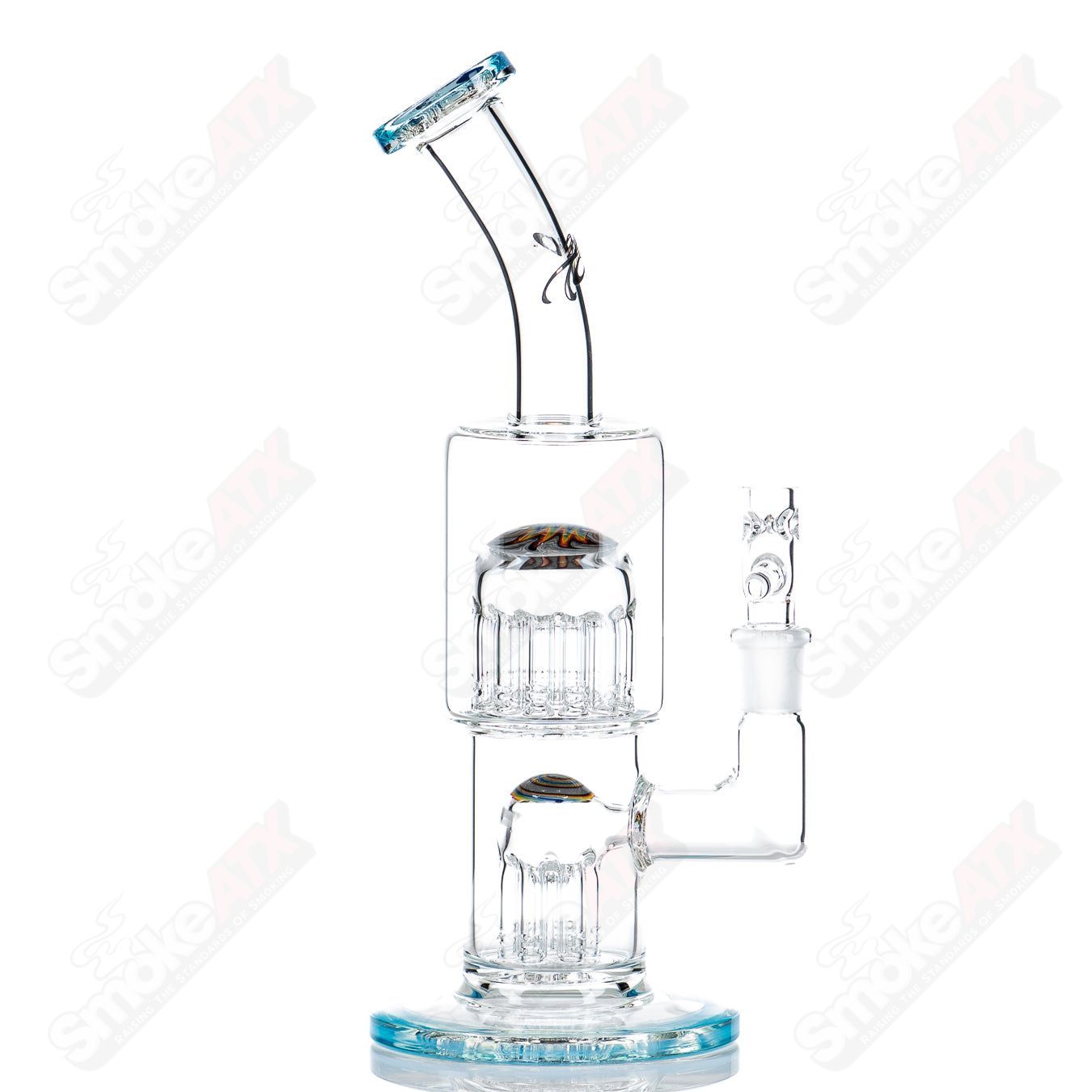 Toro Glass double Micro 7/13 arm perc bubbler with worked sections, showcasing intricate glasswork and a sleek design.