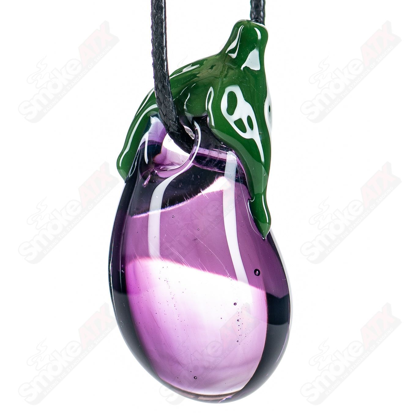 Glass by Boots eggplant pendant featuring a vibrant, handcrafted glass pendant shaped like an eggplant on a chain.