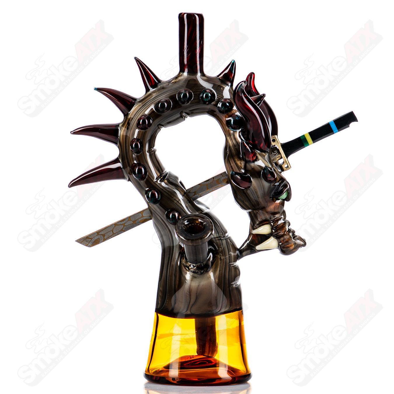 Electrum Dragon Rig by Tony Kazy, a colorful heady glass concentrate rig with intricate dragon design and artistic glasswork.