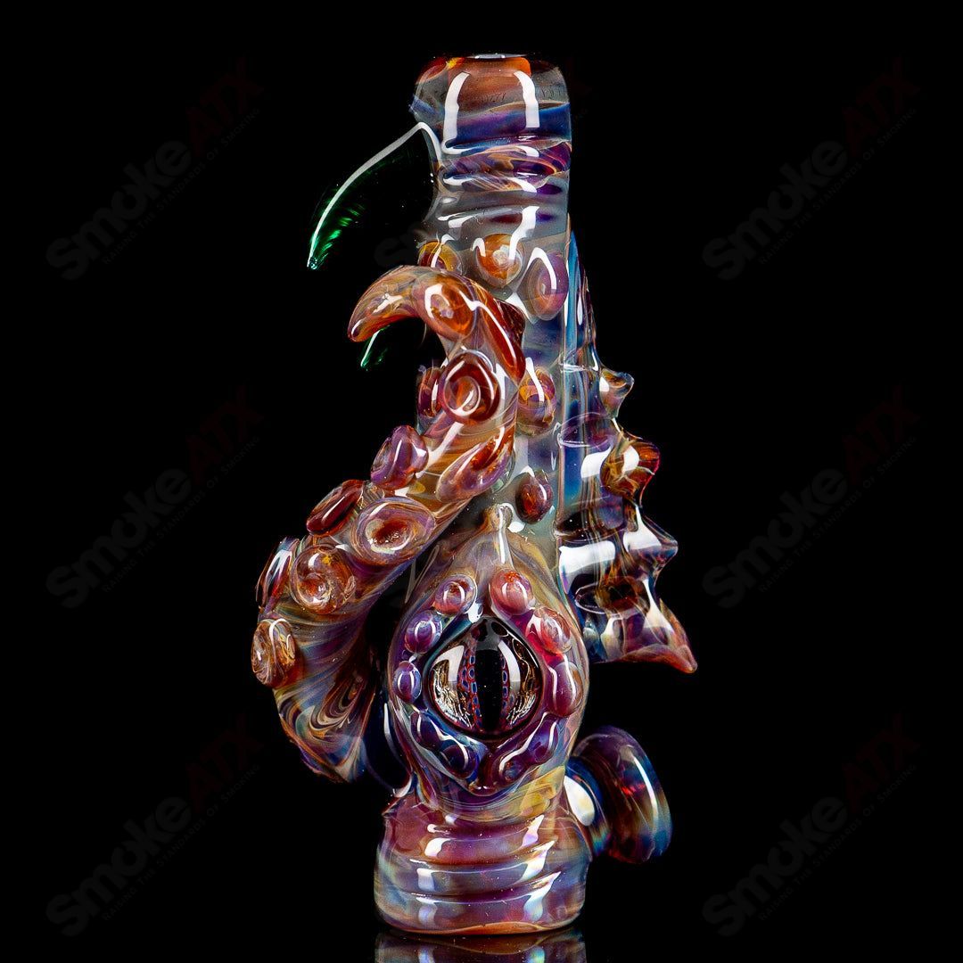 Mako Glass #2 Octopus Chillum, hand-blown heady glass pipe with octopus design, featuring intricate glasswork and vibrant colors.