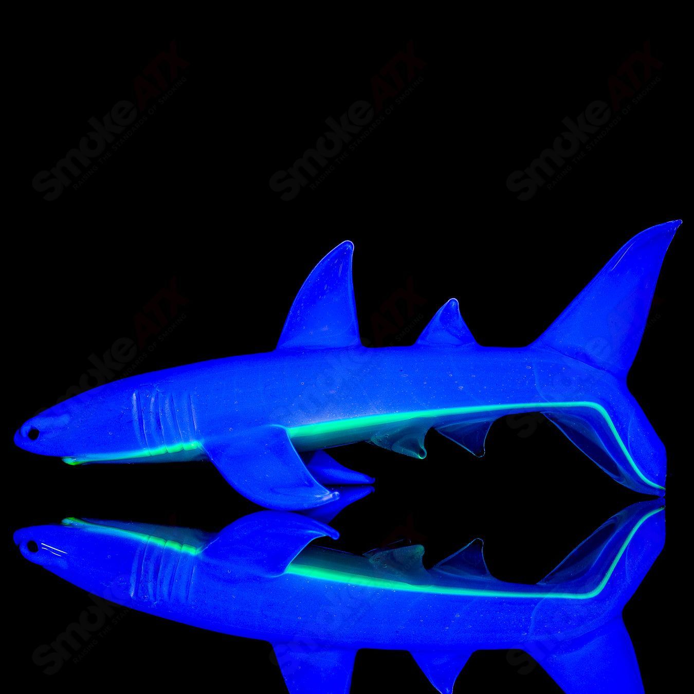 Mako Glass Shark Handpipe, a colorful heady glass pipe featuring a shark design, on a neutral background.