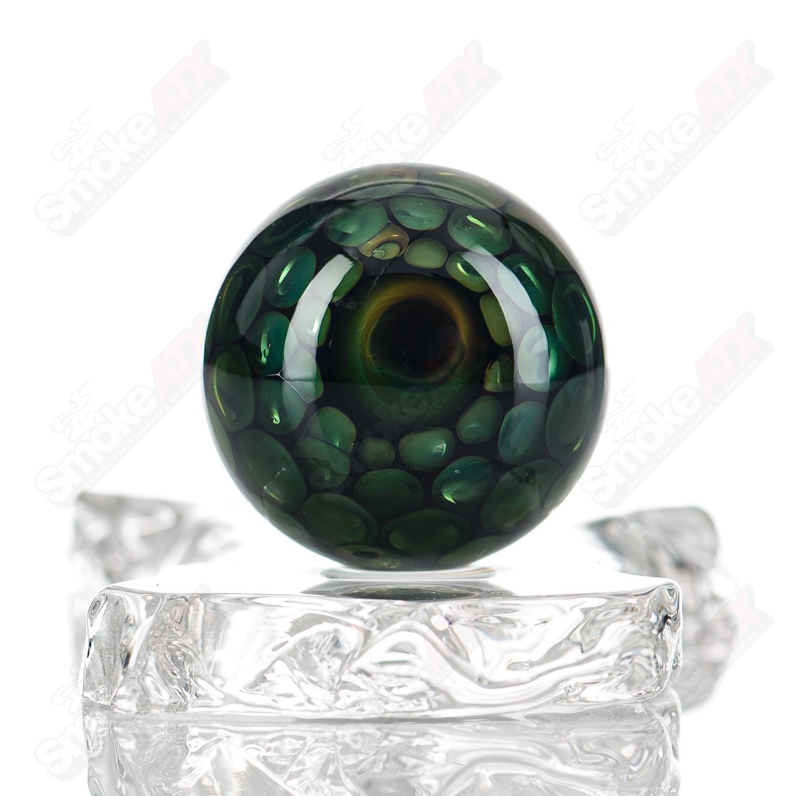 Clear marble glass from Flex Glass featuring a smooth, rounded design with a marbled finish, ideal for decorative or craft use.