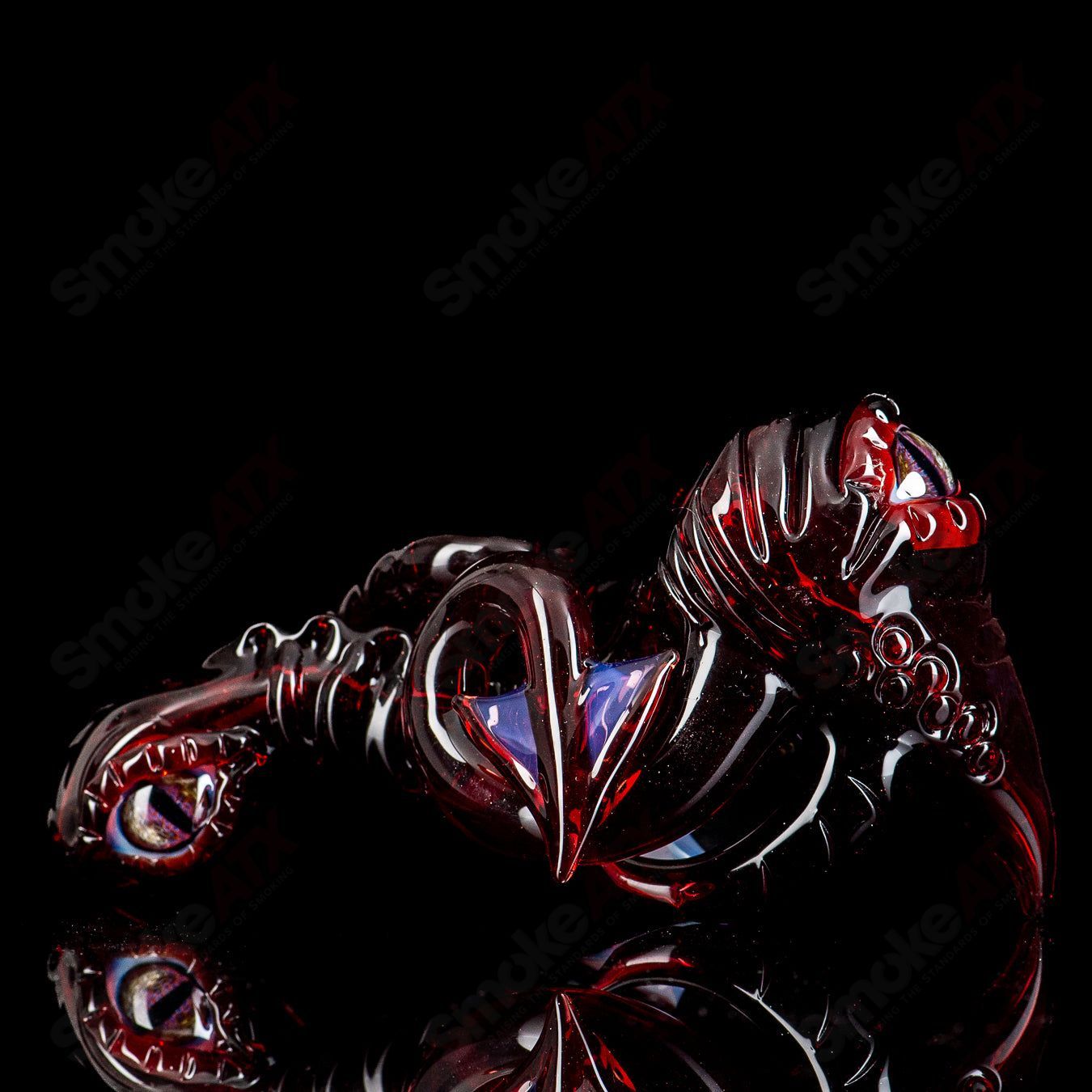 Mako Glass #1 Handpipe, a heady glass hand pipe with intricate designs, showcasing vibrant colors and craftsmanship.