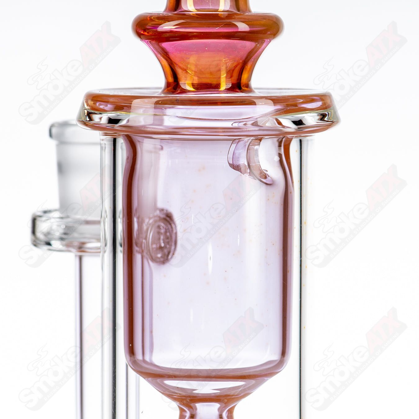 Fumed Incycler Leisure Glass concentrate rig with a sleek, smoked design and intricate glasswork for dabbing and concentrates.