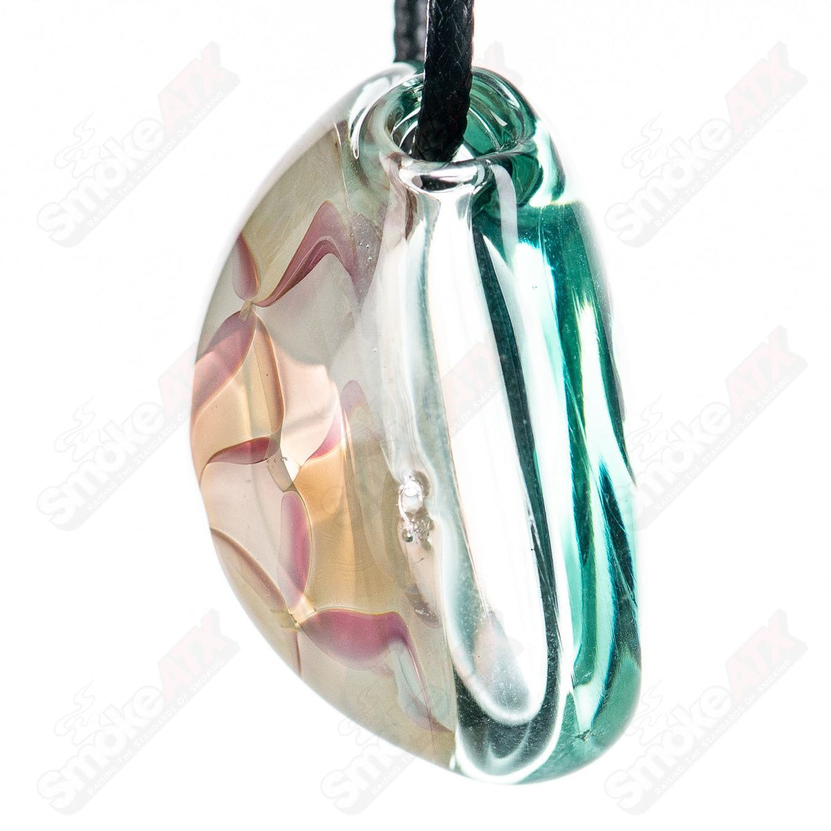 Fumed glass pendant by Gurk, featuring swirling smoky patterns and a sleek, modern design for stylish jewelry accessories.