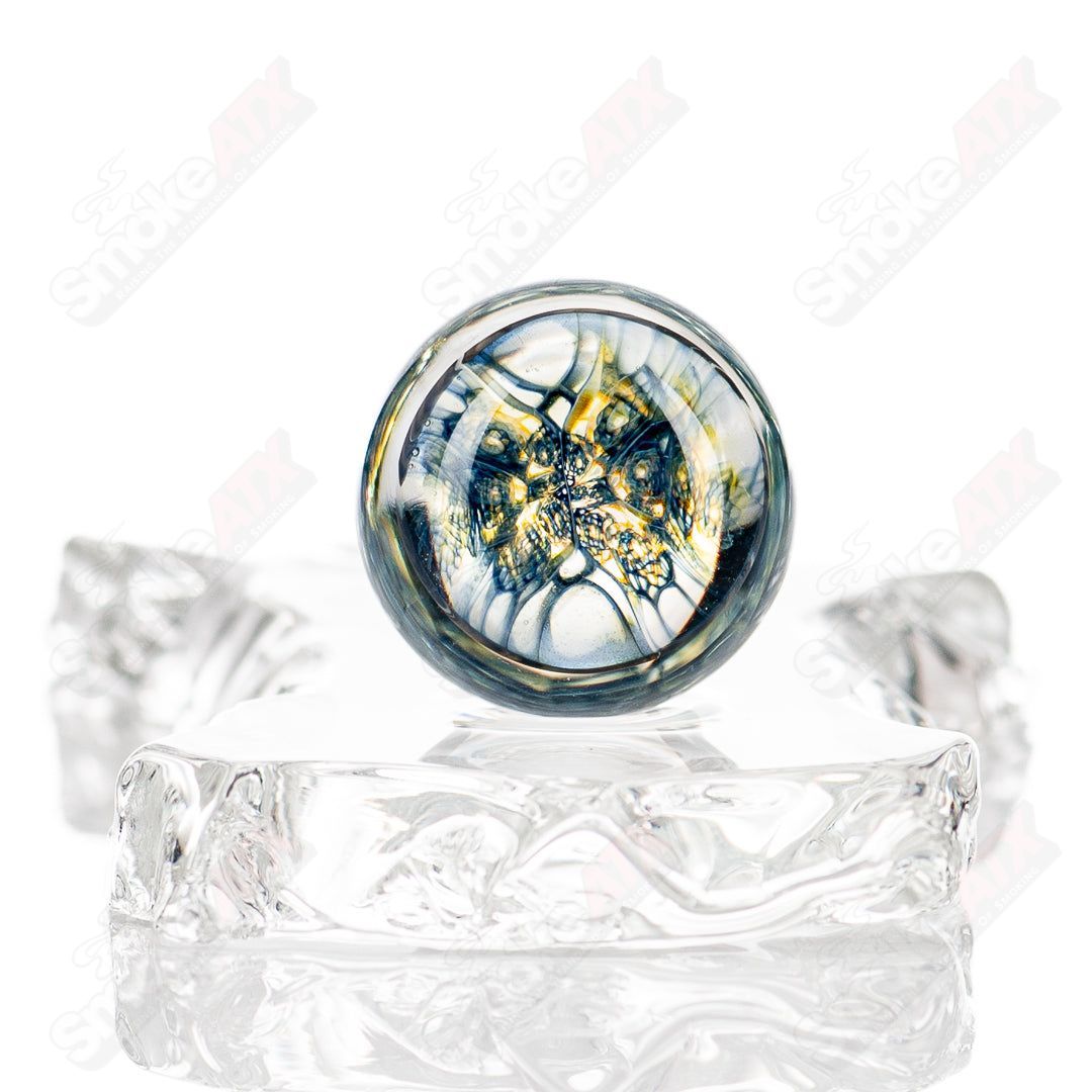 Faceted UV composite marble Indo Glass decorative glass with intricate facets and a glossy finish.