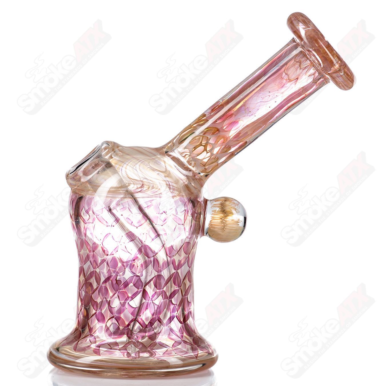 Gold Fume Layback Rig by Nancy Glass, glass concentrate rig with gold-fumed design, featuring a sleek, curved shape for smooth use.