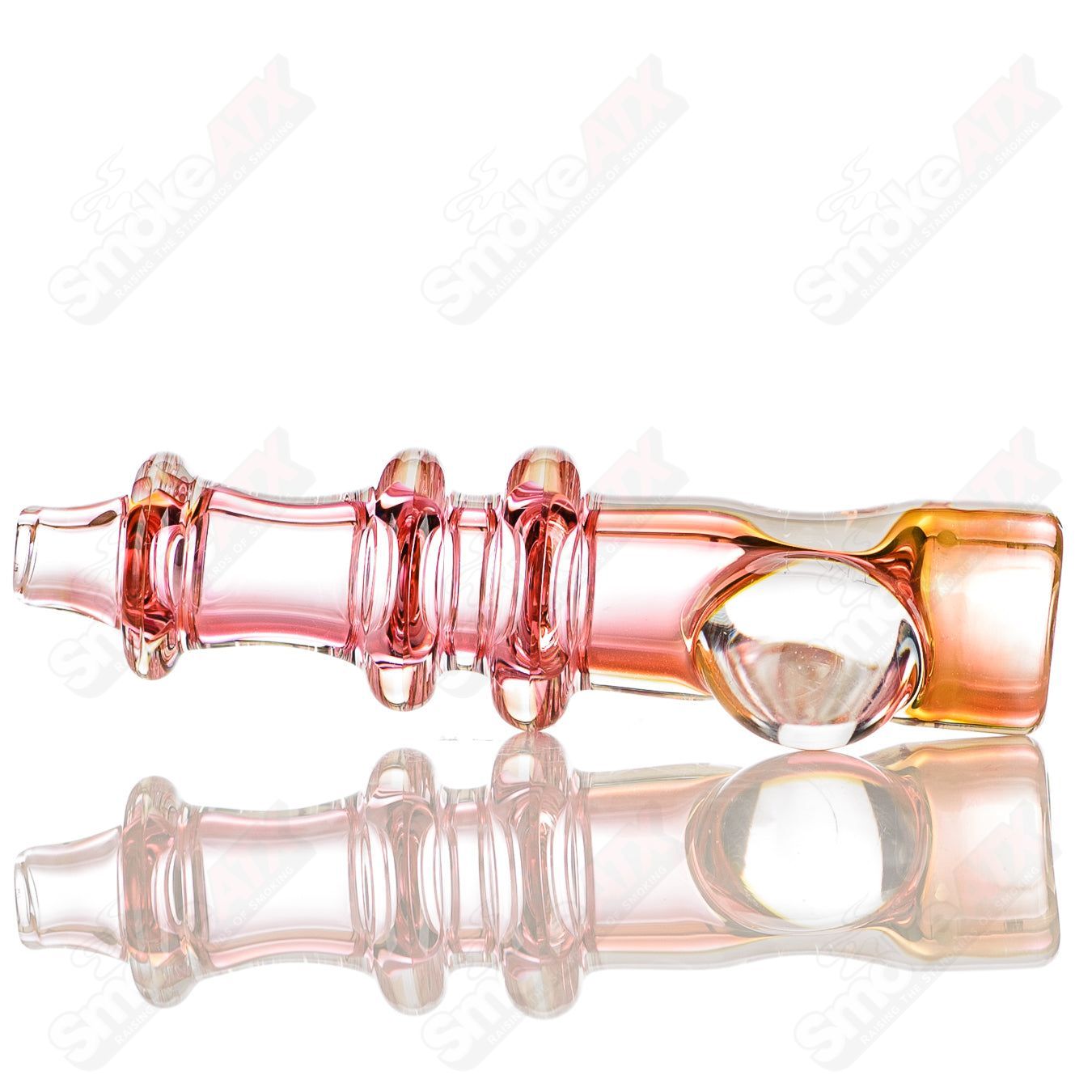Gold fumed triple Maria chillum with clear dot signature by JMK Glass, featuring intricate glasswork and gold accents.