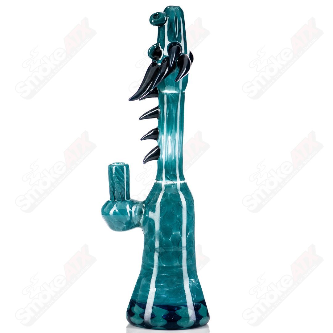 Focused Fire Dragon Tube waterpipe featuring colorful glass artwork and a sturdy glass mouthpiece for smooth smoking.