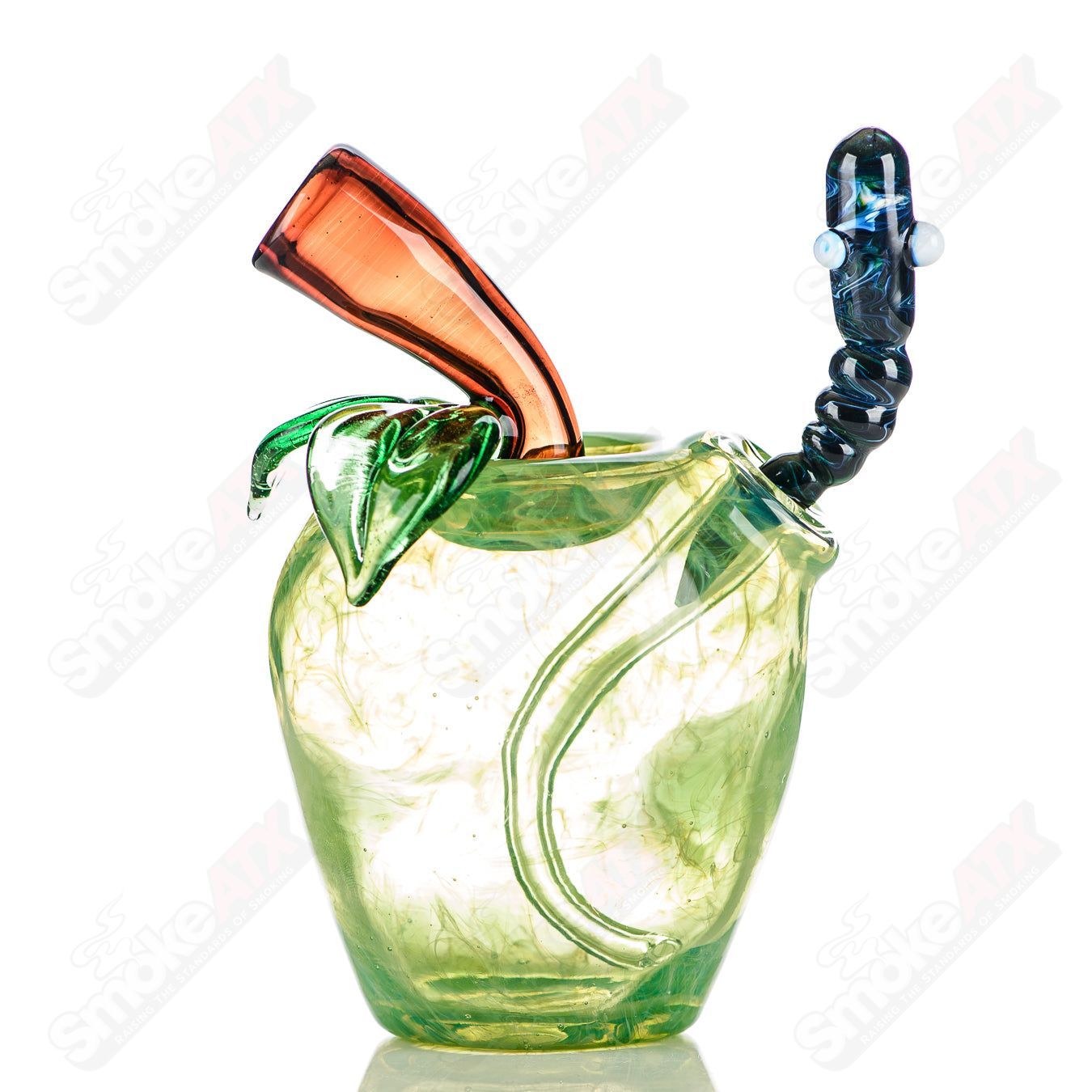 Green apple-themed rig with a worm dabber and pouch, made of glass, designed for concentrates by Pouch Glass.