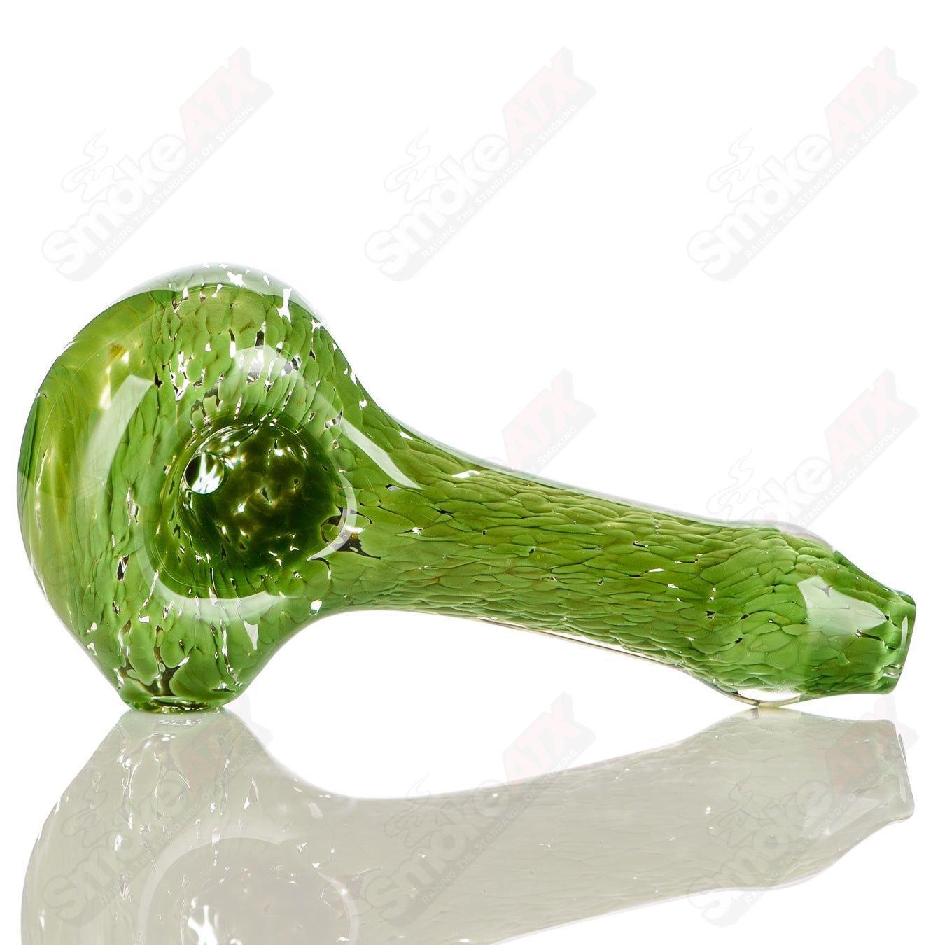 Green frit glass spoon pipe signed by JMK Glass, showcasing vibrant green coloration and handcrafted detailing.