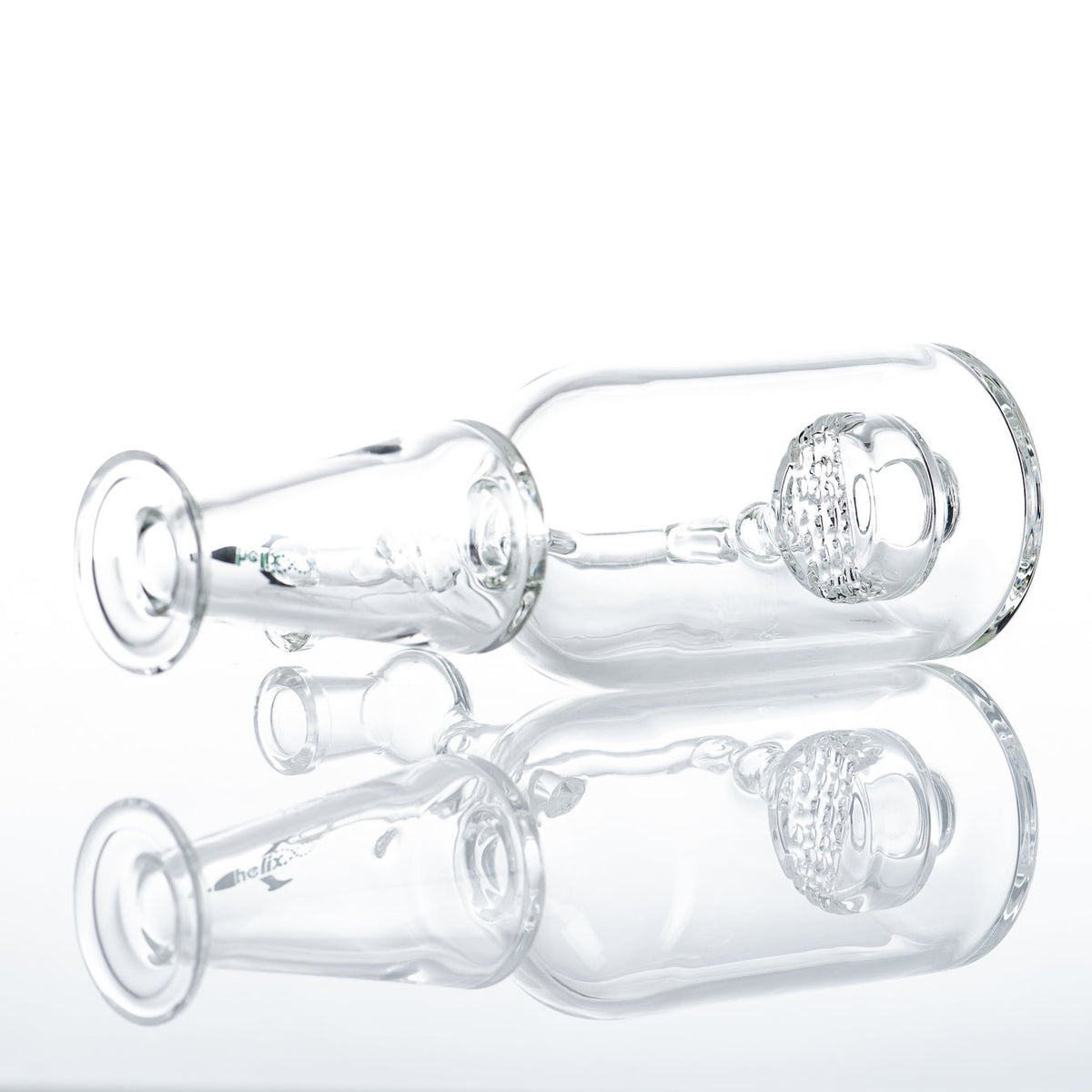 Green Label Bottle Rocket Bubbler by American Helix, clear glass recycler with green accents, detailed mouthpiece and base design.