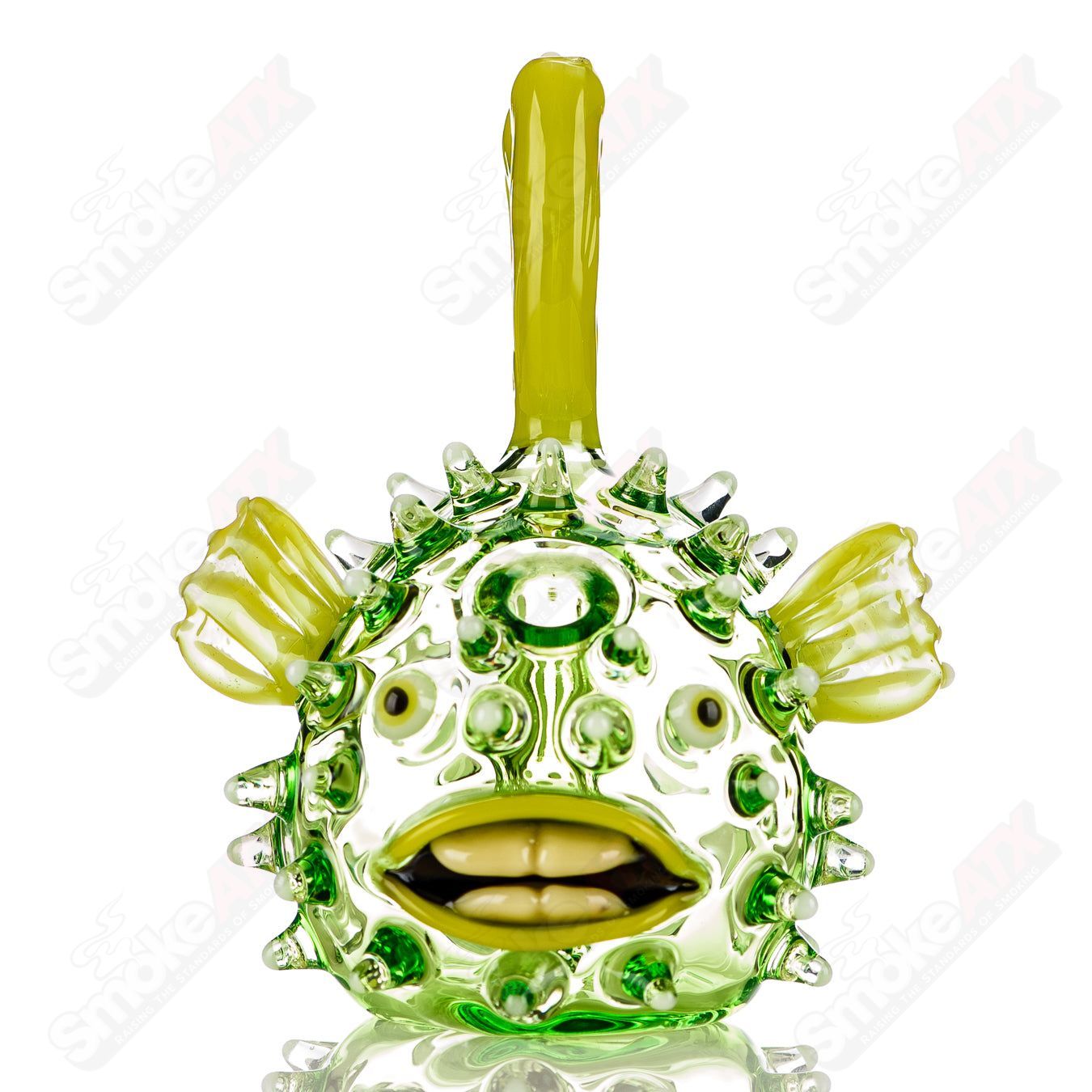 Green puffer concentrate rig with glow accents by Chadd Lacy Glass, featuring intricate glasswork and vibrant colors.