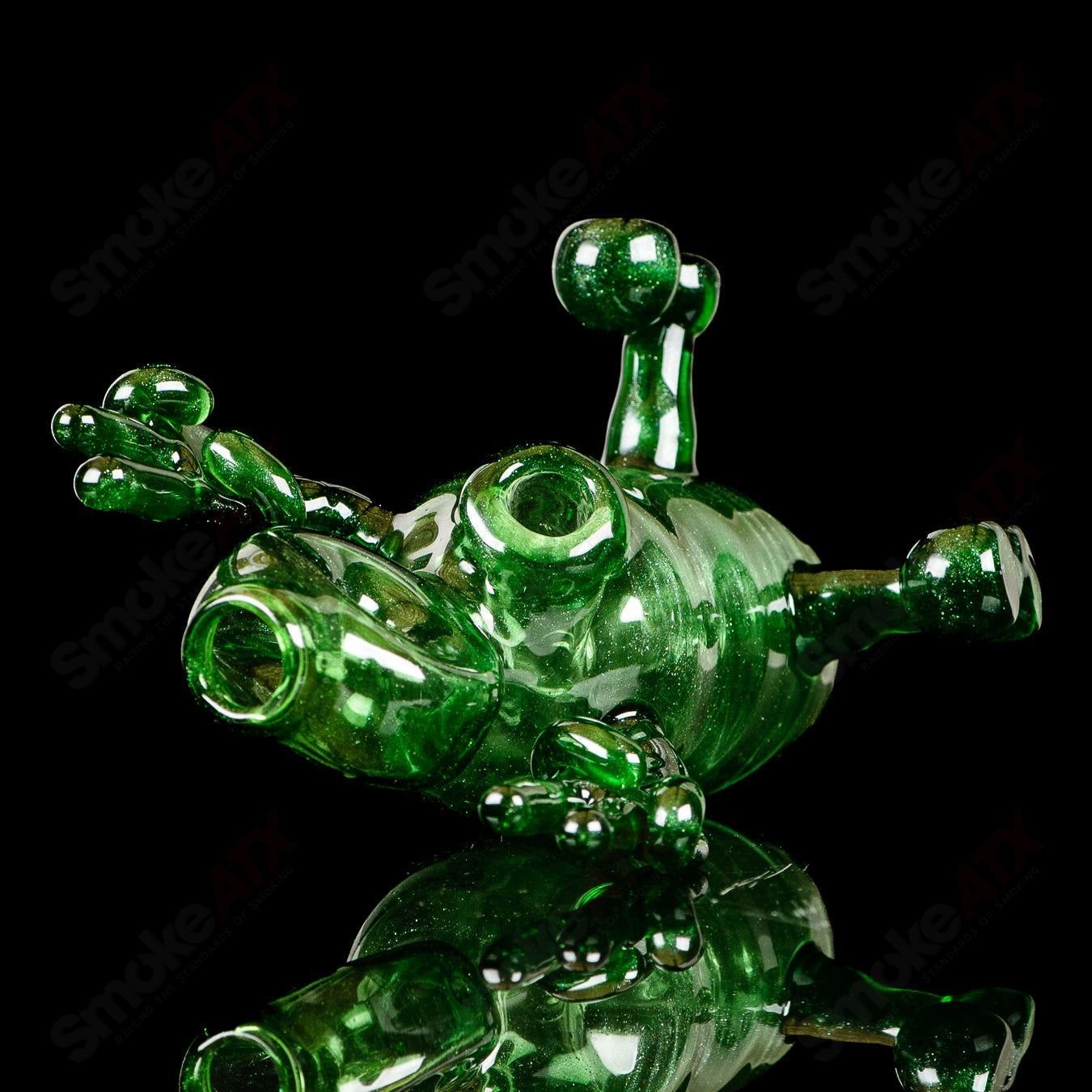 Green MJ Meltz Sitter Tube concentrate rig with pendant, made of heady glass, featuring a vibrant green design and intricate details.