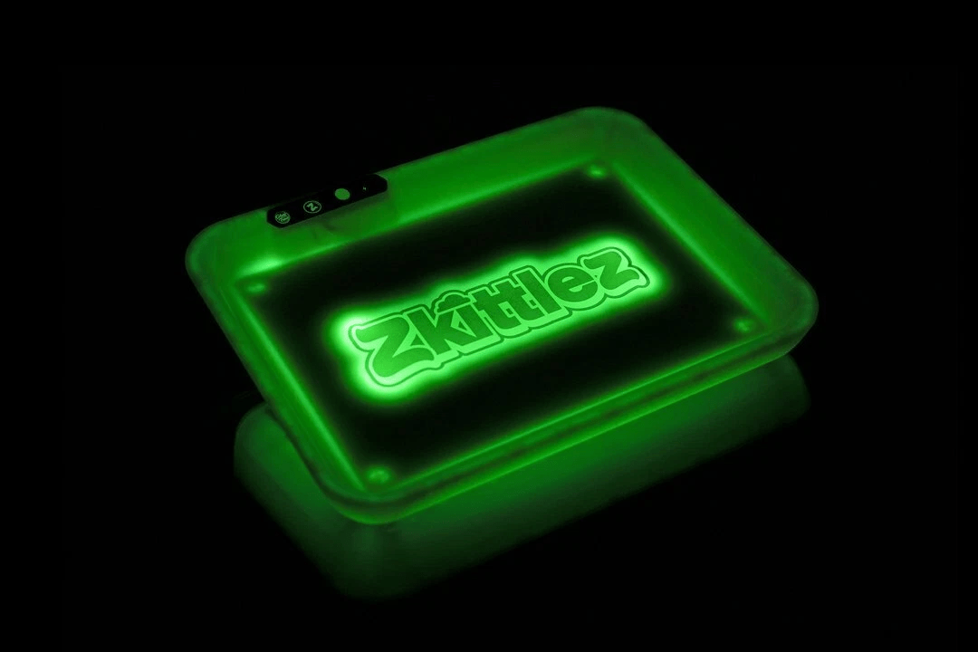 Green Zkittlez Glow Tray from Glow Tray, a 420 rolling tray with vibrant green and colorful Zkittlez design, ideal for storing smoking accessories.