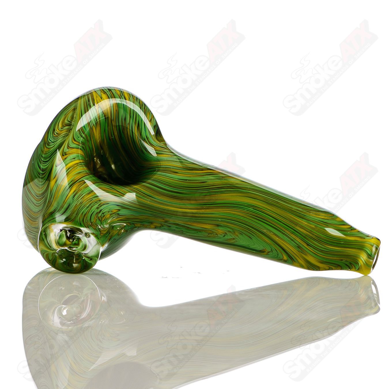 Green and yellow worked glass spoon pipe signed by JMK Glass, featuring intricate hand-blown design and smooth curves.
