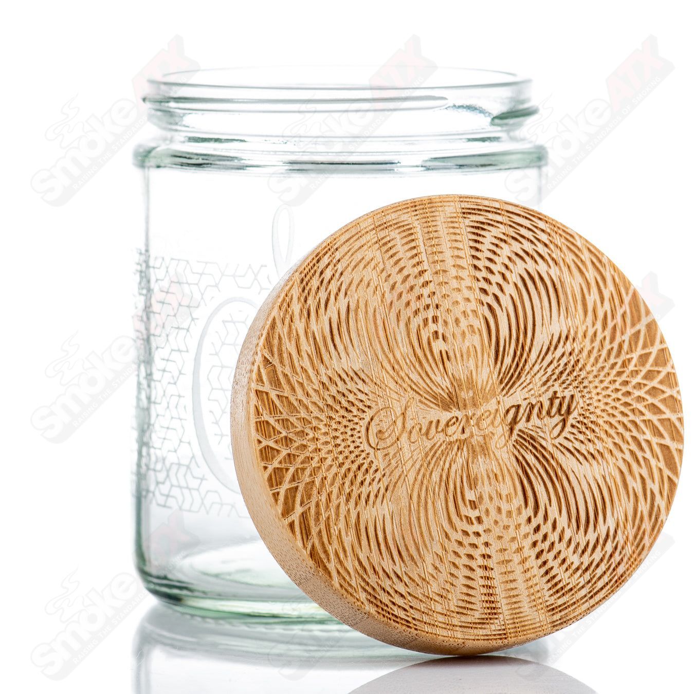 Sovereignty Glass Hex Connect Pattern Nug Jar with bamboo lid, clear glass container for storing small items or cannabis.