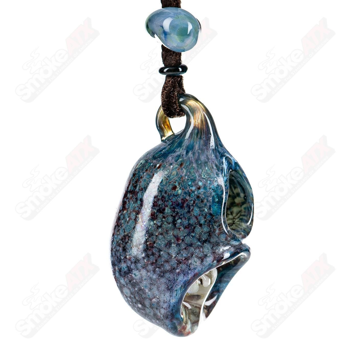Kengtaro Hide and Seek Frog pendant made of colorful glass, featuring a detailed frog design on a clear pendant.