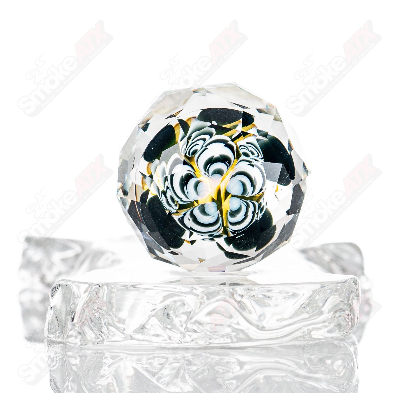 Fatal Facets UV faceted dotstack marble, heady glass piece with vibrant colors and intricate dot patterns, designed for decorative display.