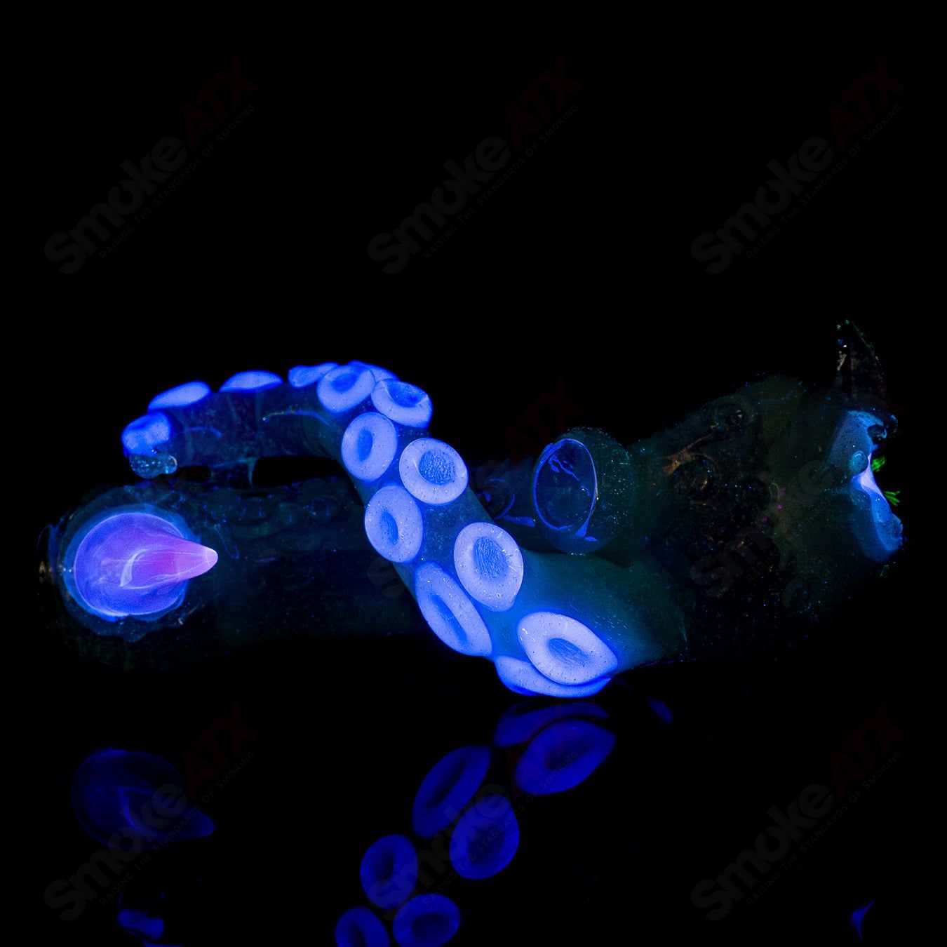 Mako Glass Heady Glass Slime Spoon hand pipe with colorful, swirling glass design and smooth mouthpiece.