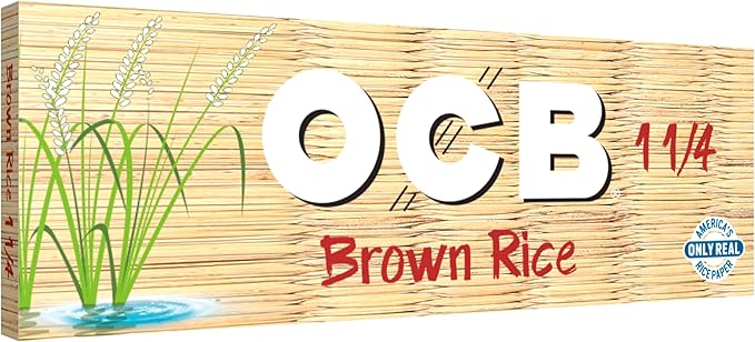 Brown rice rolling papers by OCB, 1 1/4 size, natural light brown color, thin and durable for rolling cigarettes or herbal wraps.