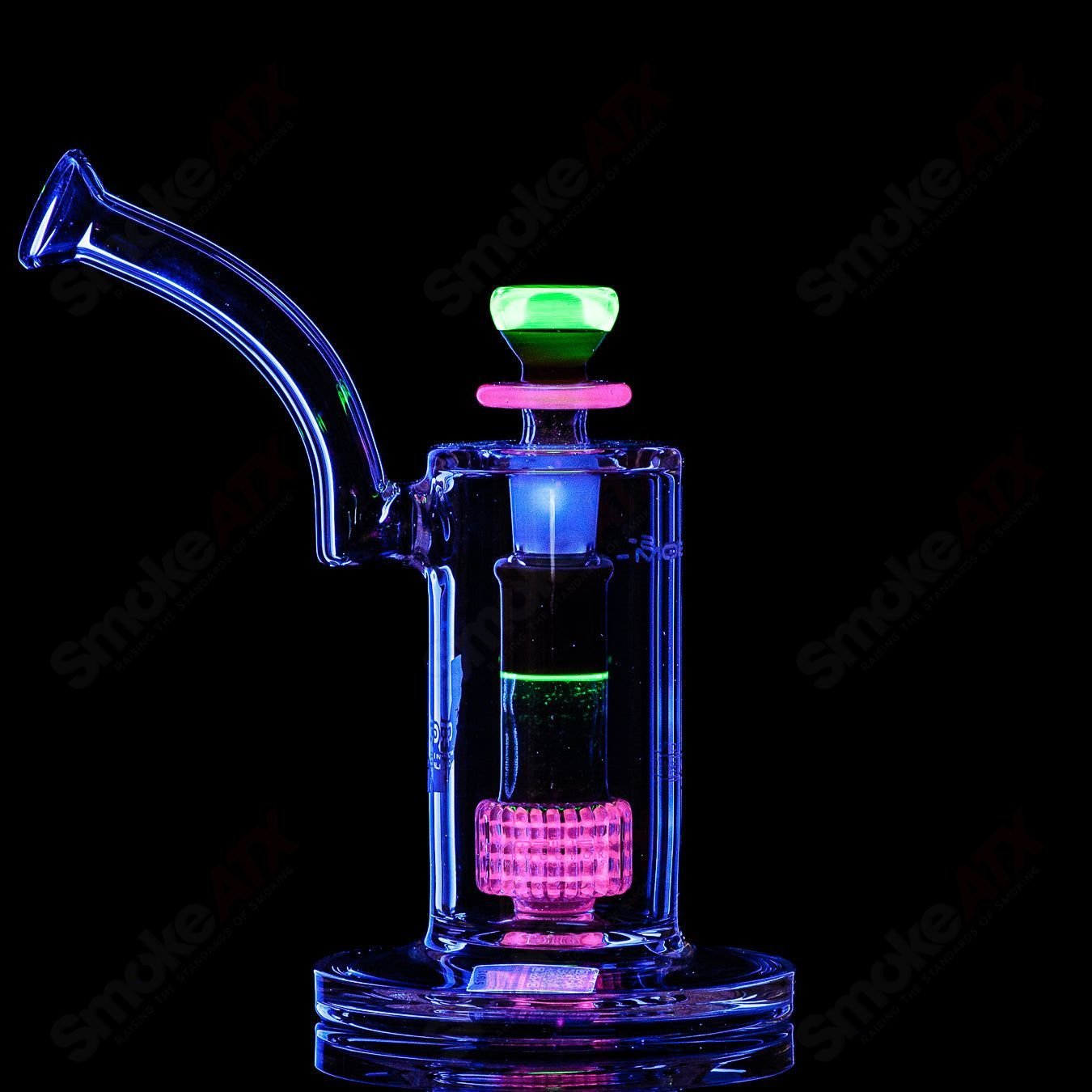 Mobius Ion Matrix V1 Accent Series glass waterpipe with intricate design, clear glass body, and artistic accents.