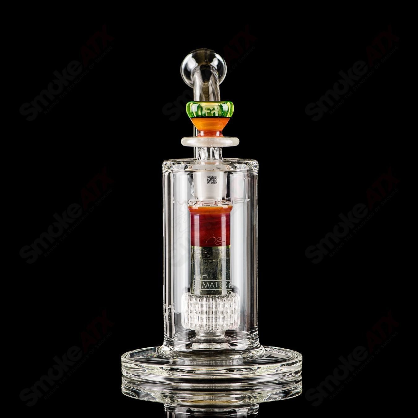 Mobius Ion Matrix V1 Accent Series glass waterpipe with intricate design, featuring clear glass and colored accents.