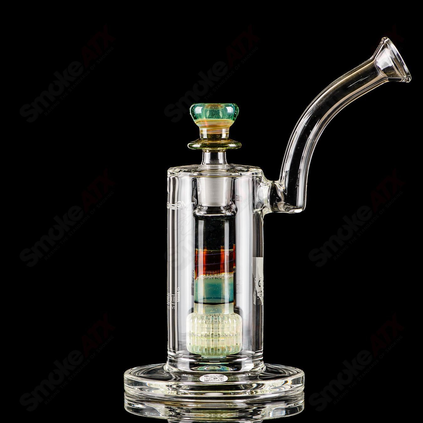 Mobius Ion Matrix V1 Accent Series glass bubbler with intricate design and clear glass construction.