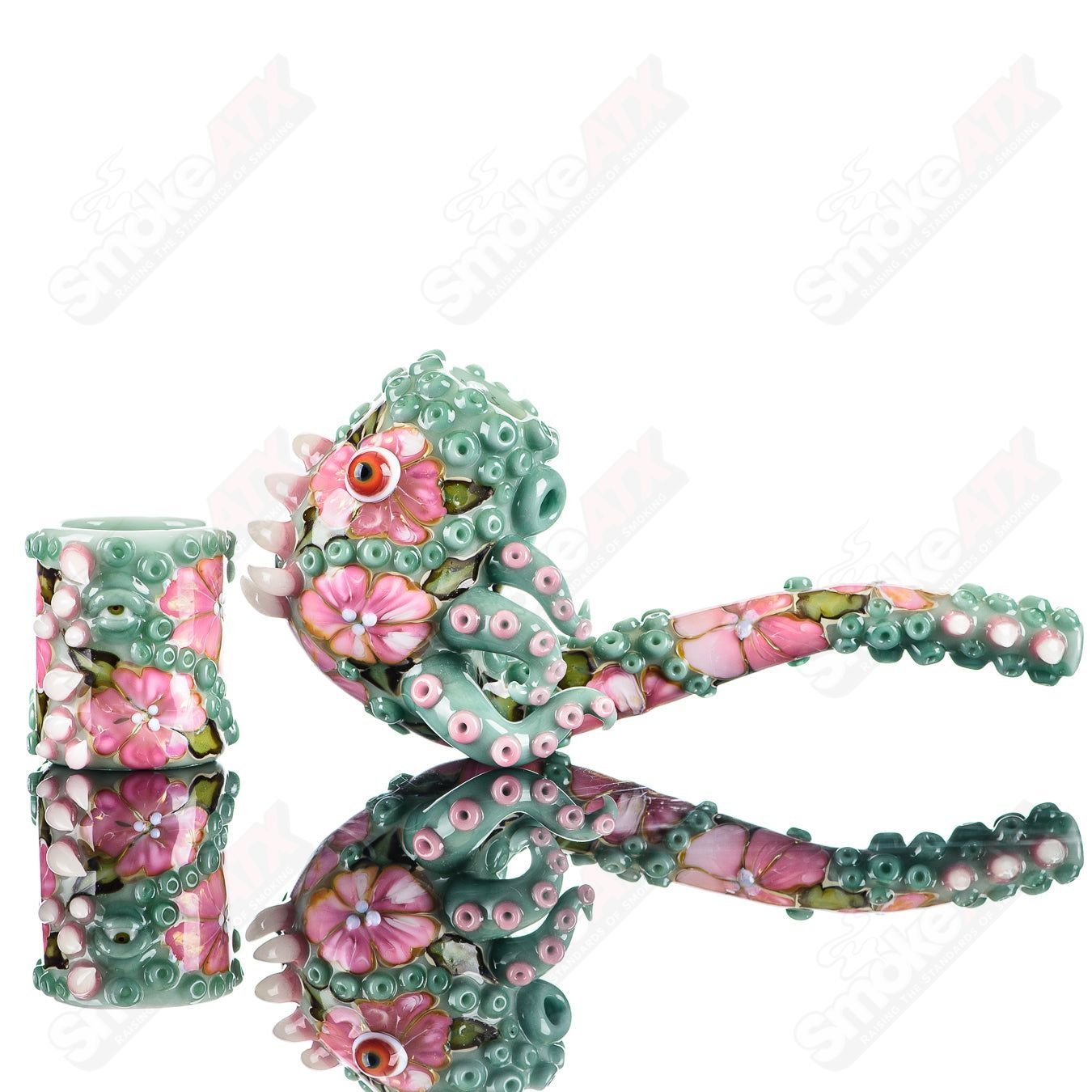 Salt Glass Jade Flower Tentacle Sherlock hand pipe with matching shotglass set, featuring intricate green jade flower and tentacle design.