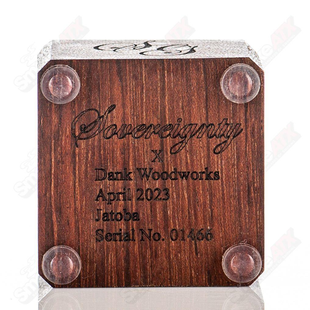 Heady Glass Jatoba 1-Hole Slide Stand by Sovereignty Glass, showcasing intricate craftsmanship and clear glass design.