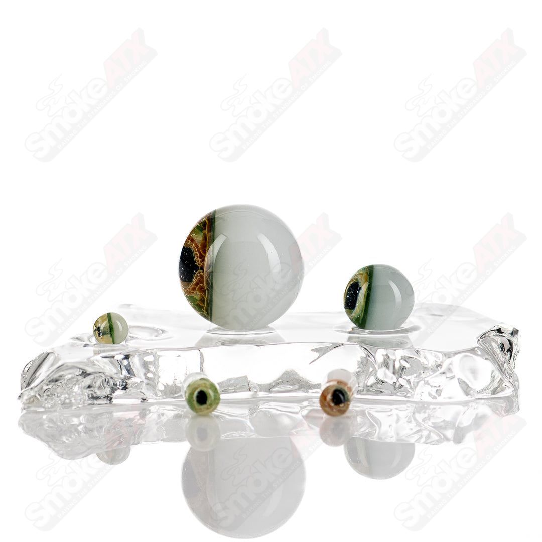 Indo Glass Dragon Eye Slurper Set featuring colorful glass pieces with dragon eye design for smoking accessories.