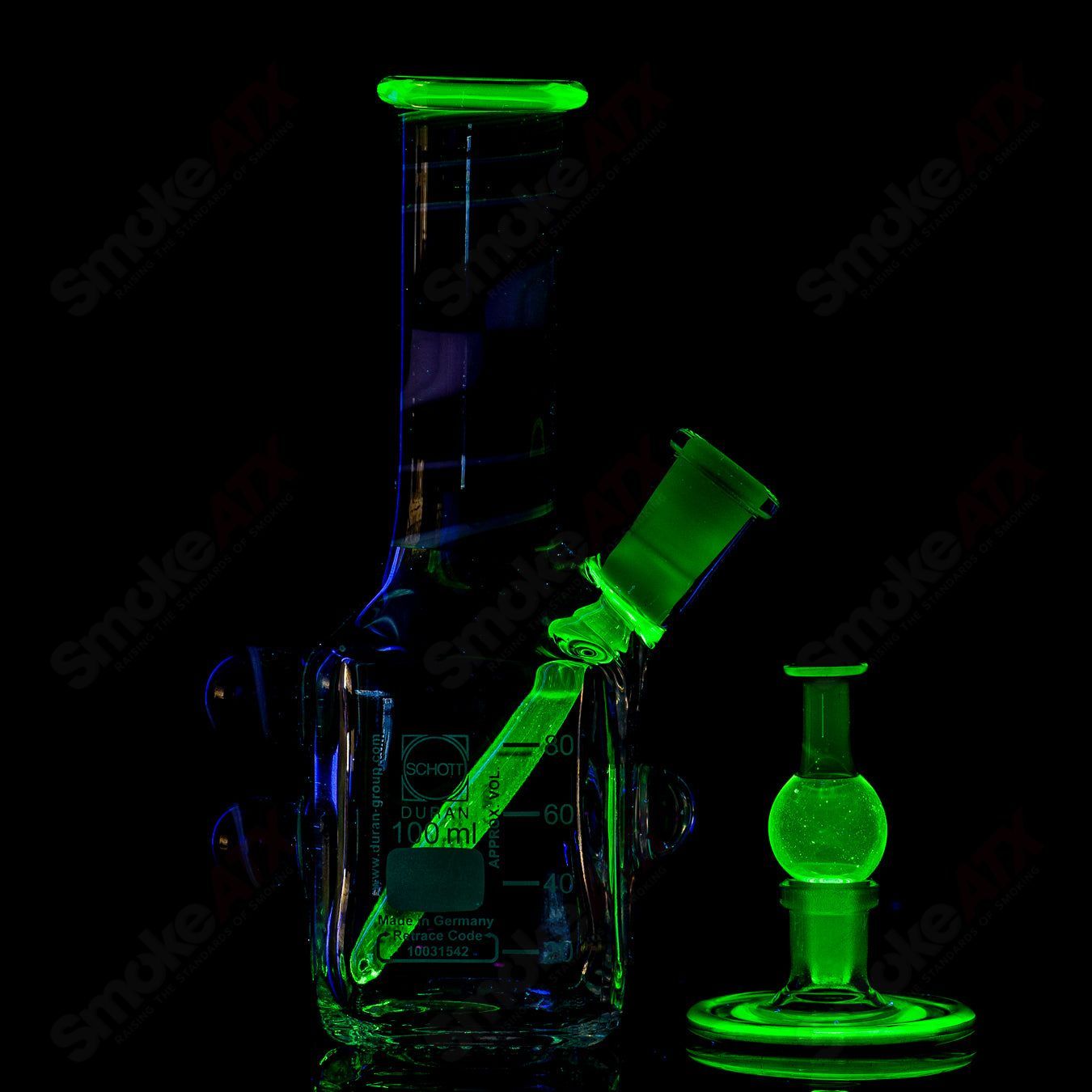 Karl 73 Mini UV Tetris Rig, a glass concentrate rig with colorful Tetris design and UV features, ideal for dabbing or concentrates.