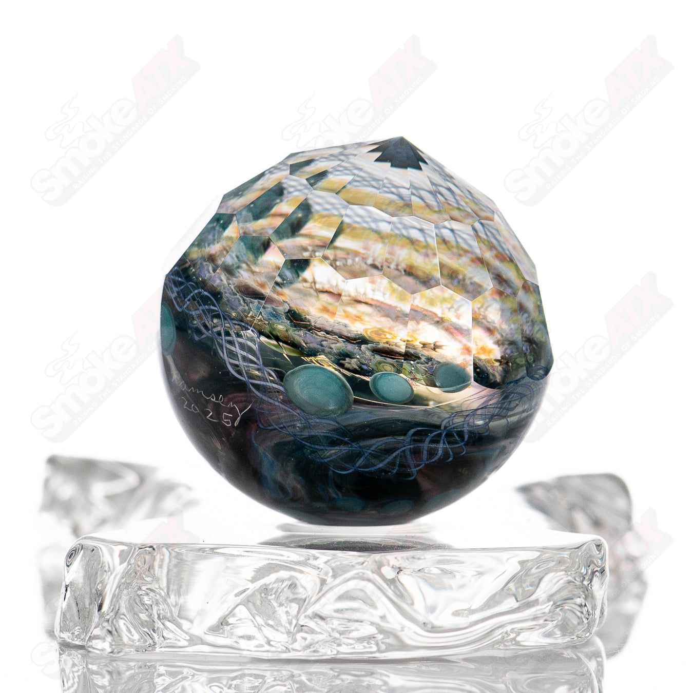 Starry marble glass impact piece by Glass Impact x Fatal Facets, featuring intricate marble designs in a clear and colorful heady glass style.