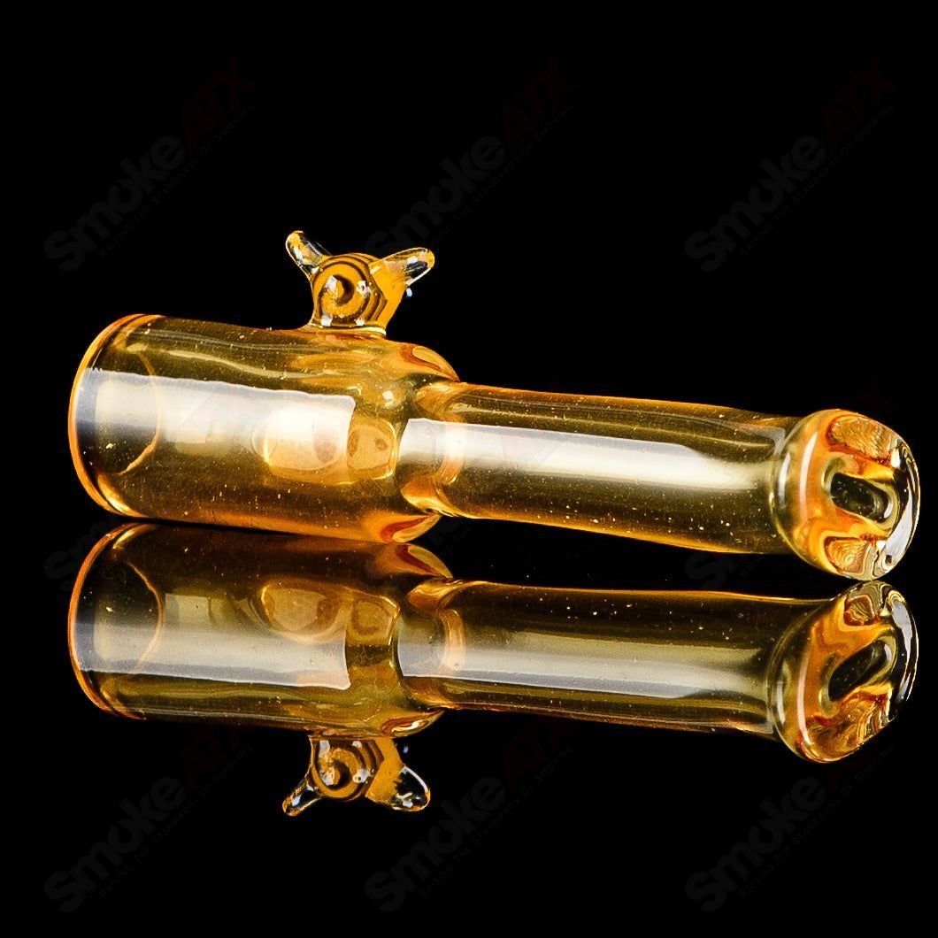 Large honeycomb and bee-themed joint holder by Joe P Glass, colorful heady glass chillum with intricate design.